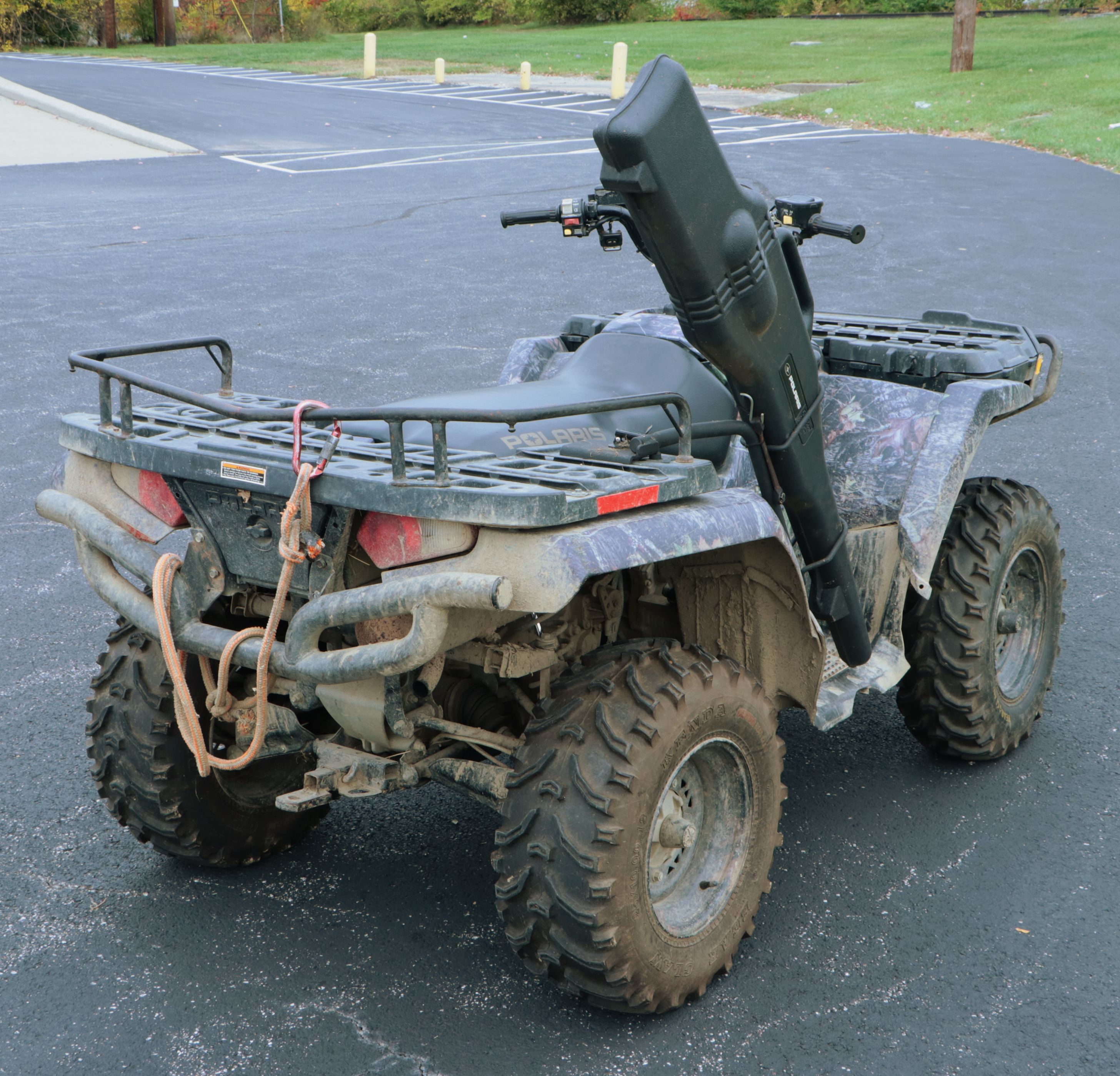 2006 Polaris Sportsman 450 ATV in Camo with Ramps, Snow Plow, and Accessories