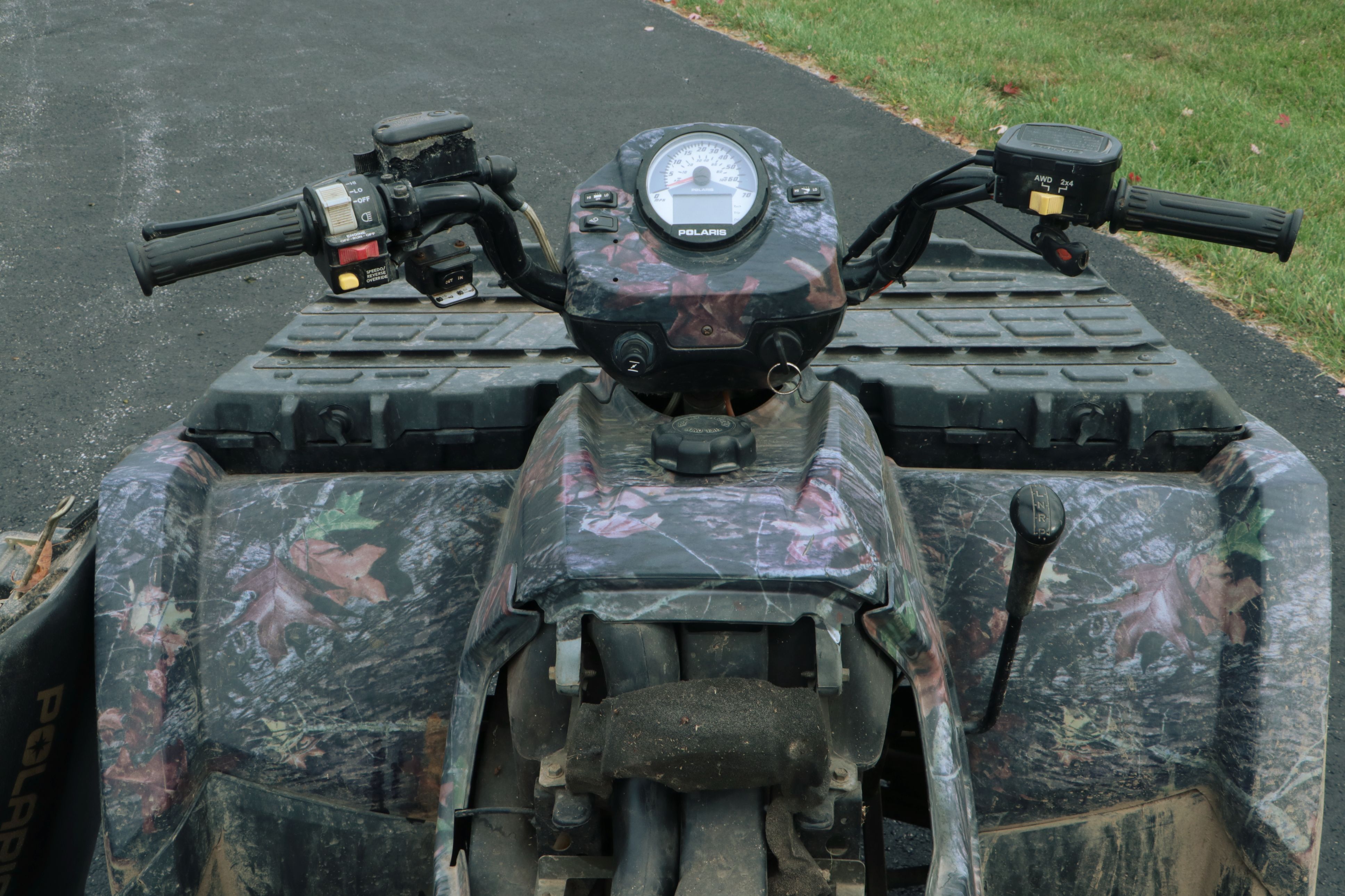 2006 Polaris Sportsman 450 ATV in Camo with Ramps, Snow Plow, and Accessories