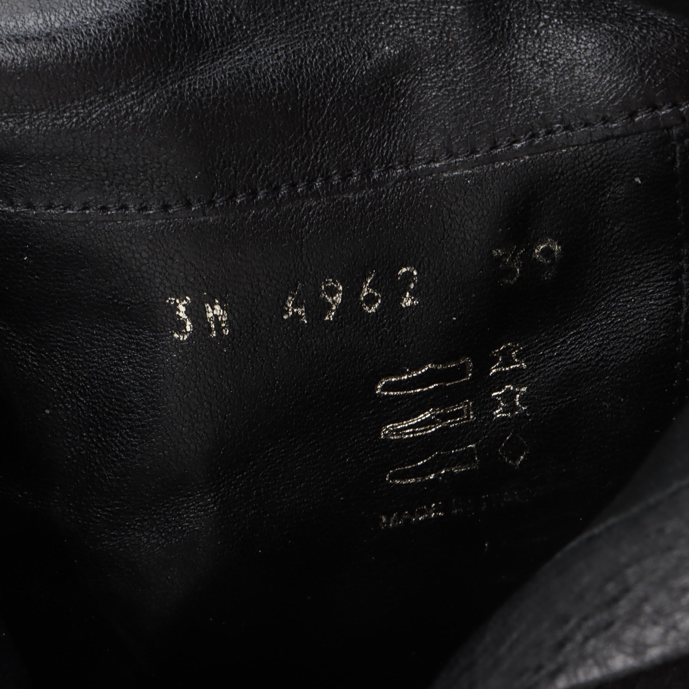 Prada Knee-High Heeled Boots in Black Grained Leather