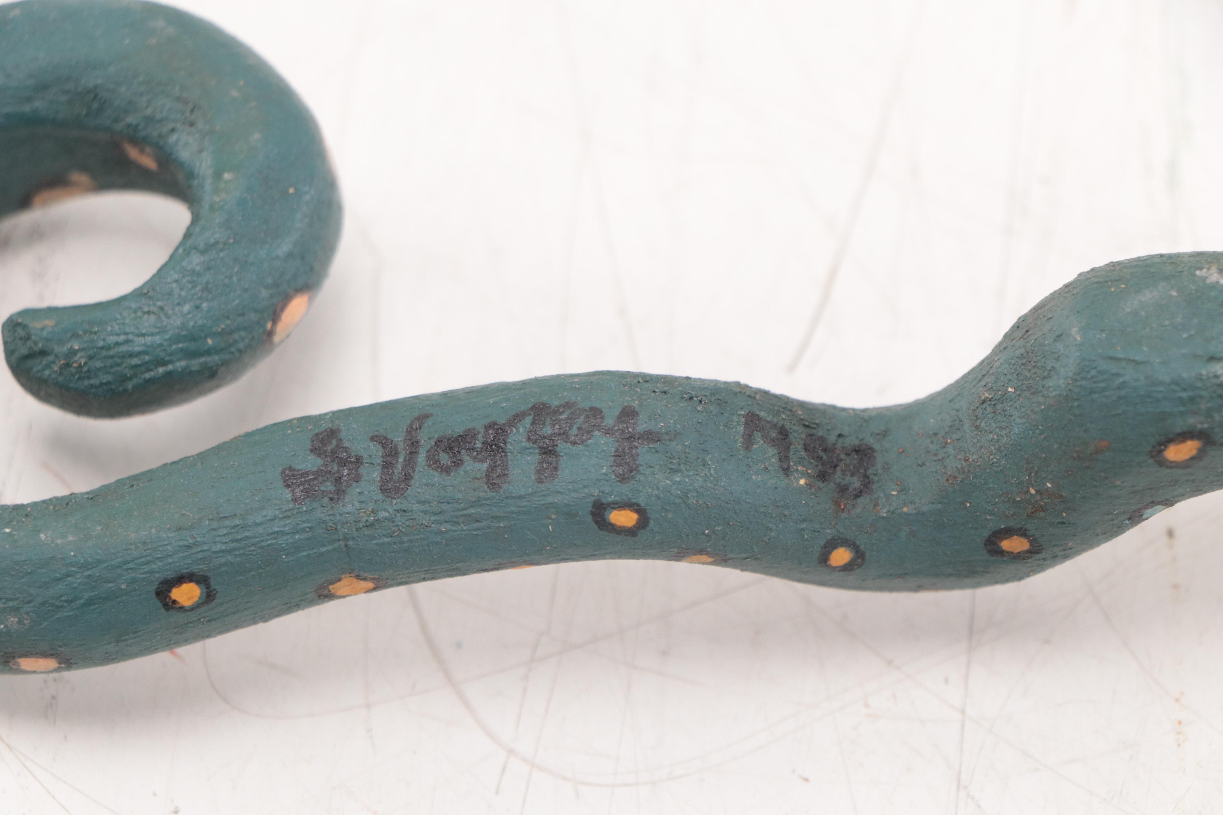 Animal Sculptures and Aboriginal Snake Painting