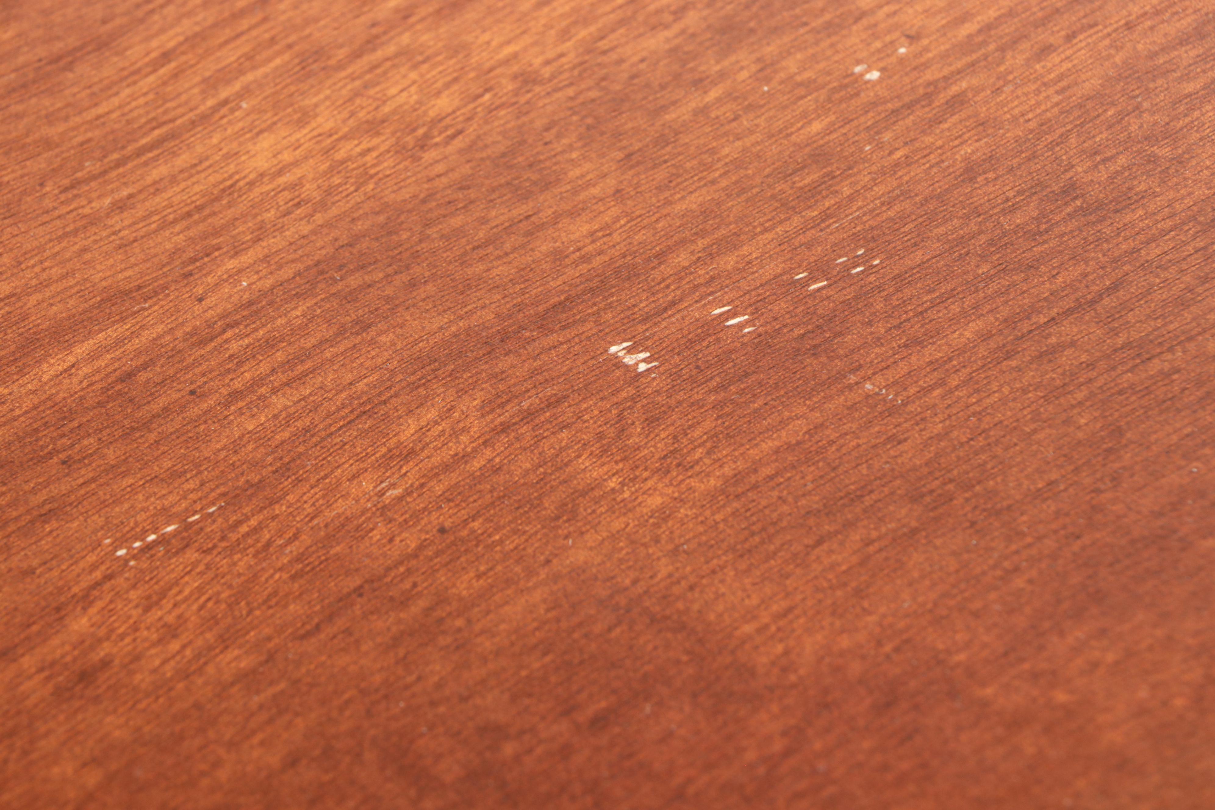 The Rike-Kumler Co. Classical Style Mahogany Extending Drop-Leaf Dining Table