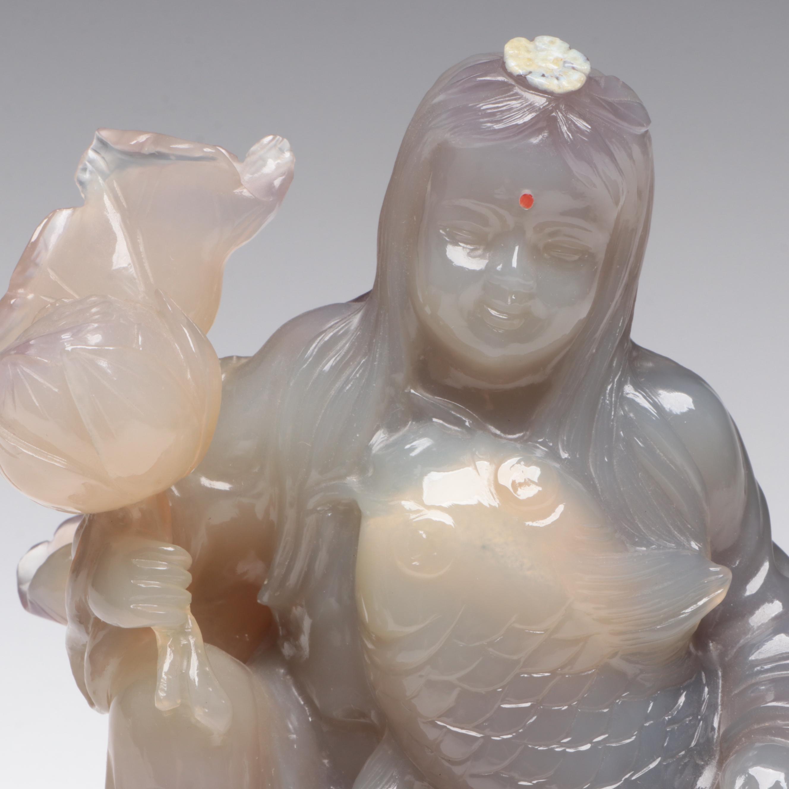 Chinese Chalcedony Carving of Woman Holding Fish and Lotus Blossom