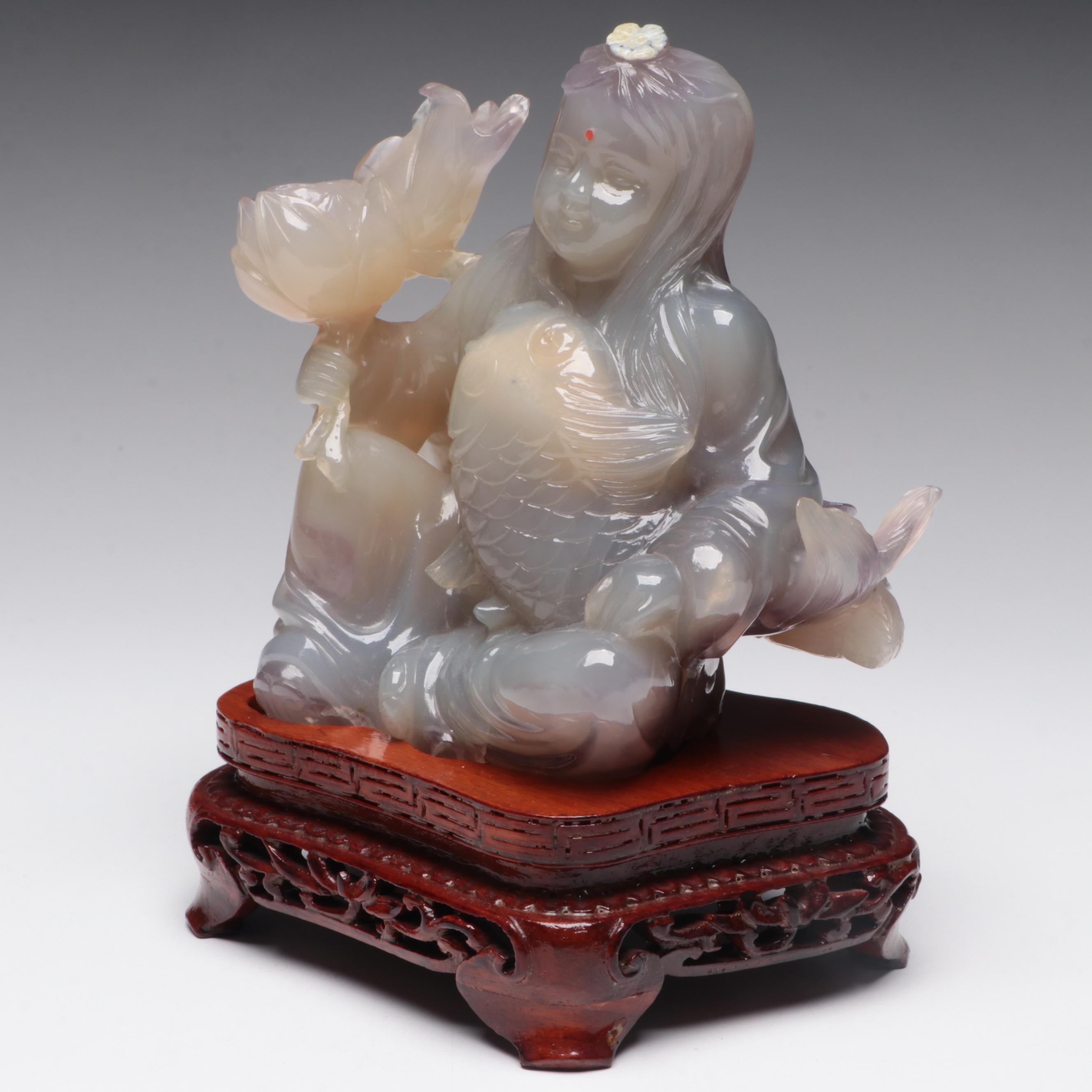 Chinese Chalcedony Carving of Woman Holding Fish and Lotus Blossom