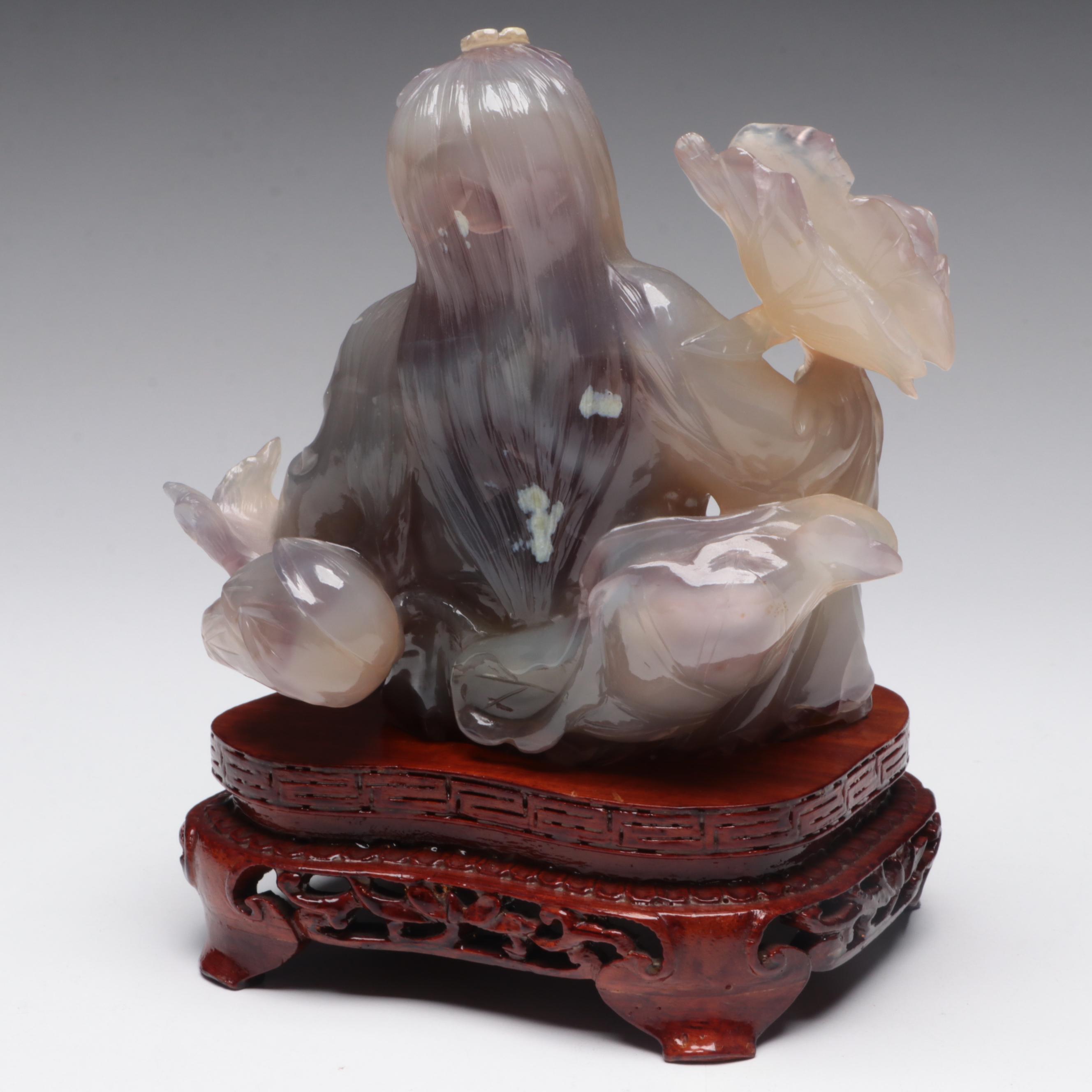 Chinese Chalcedony Carving of Woman Holding Fish and Lotus Blossom
