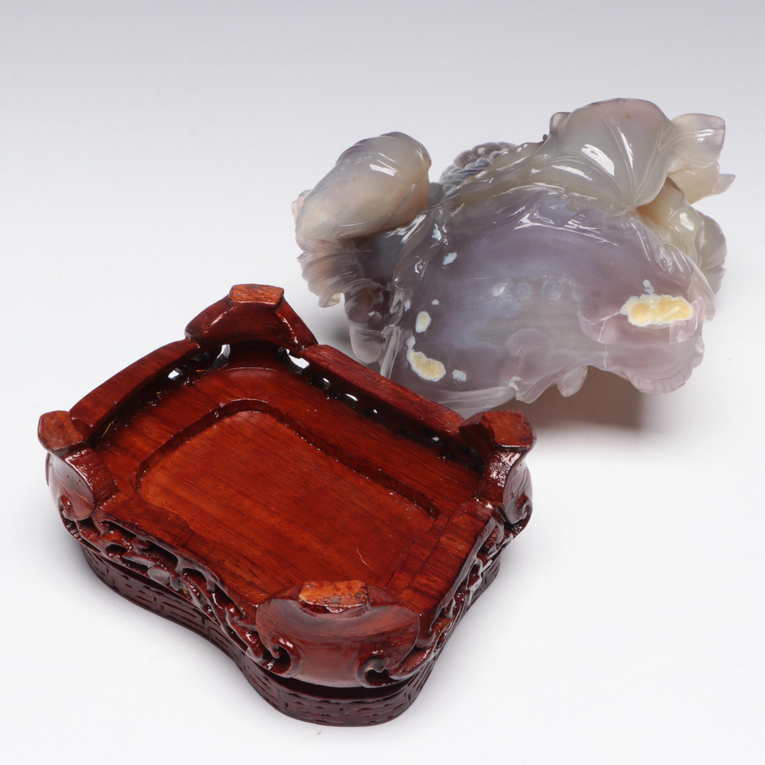 Chinese Chalcedony Carving of Woman Holding Fish and Lotus Blossom