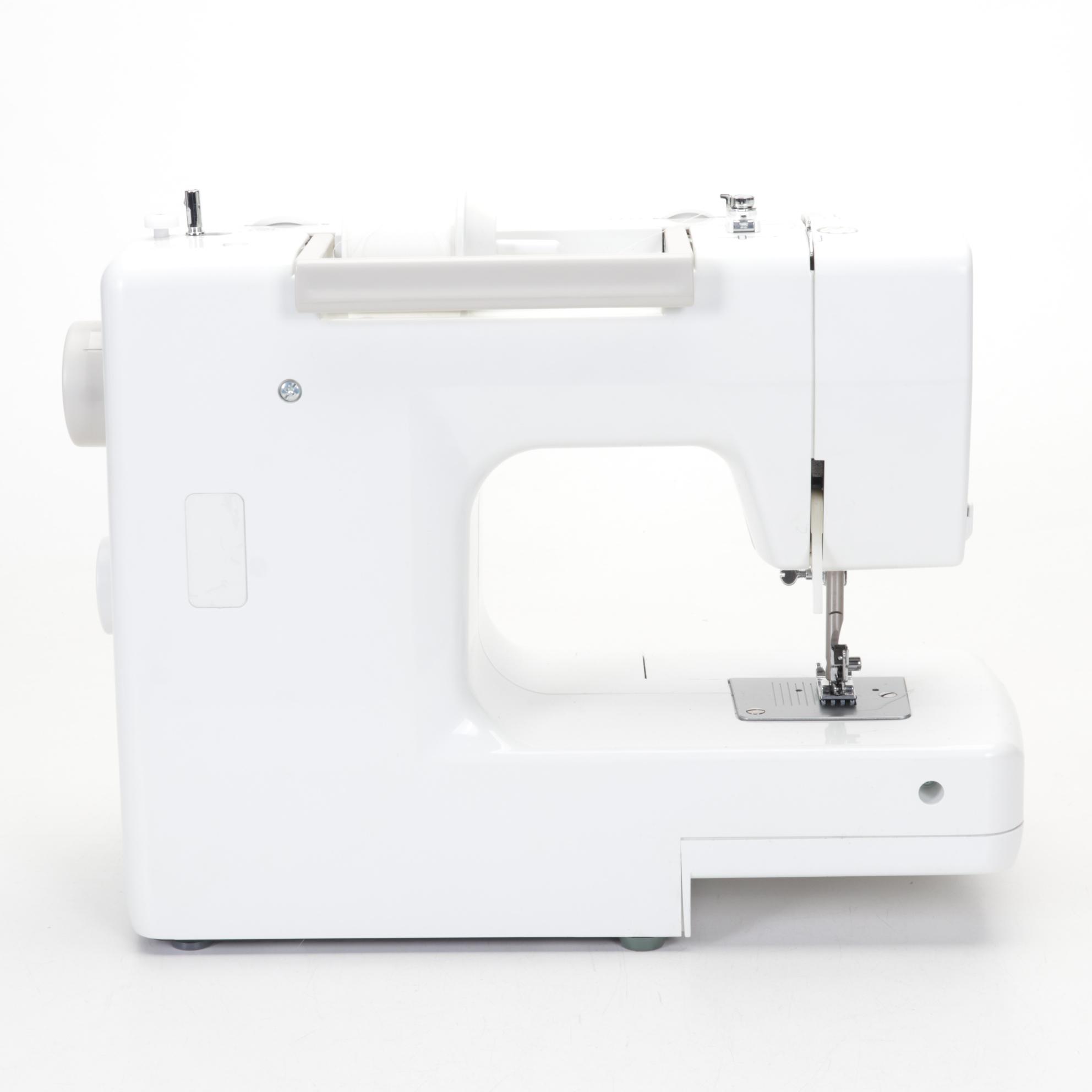 Husqvarna Sewing Machine with FabUMotion Embroidery Attachment and