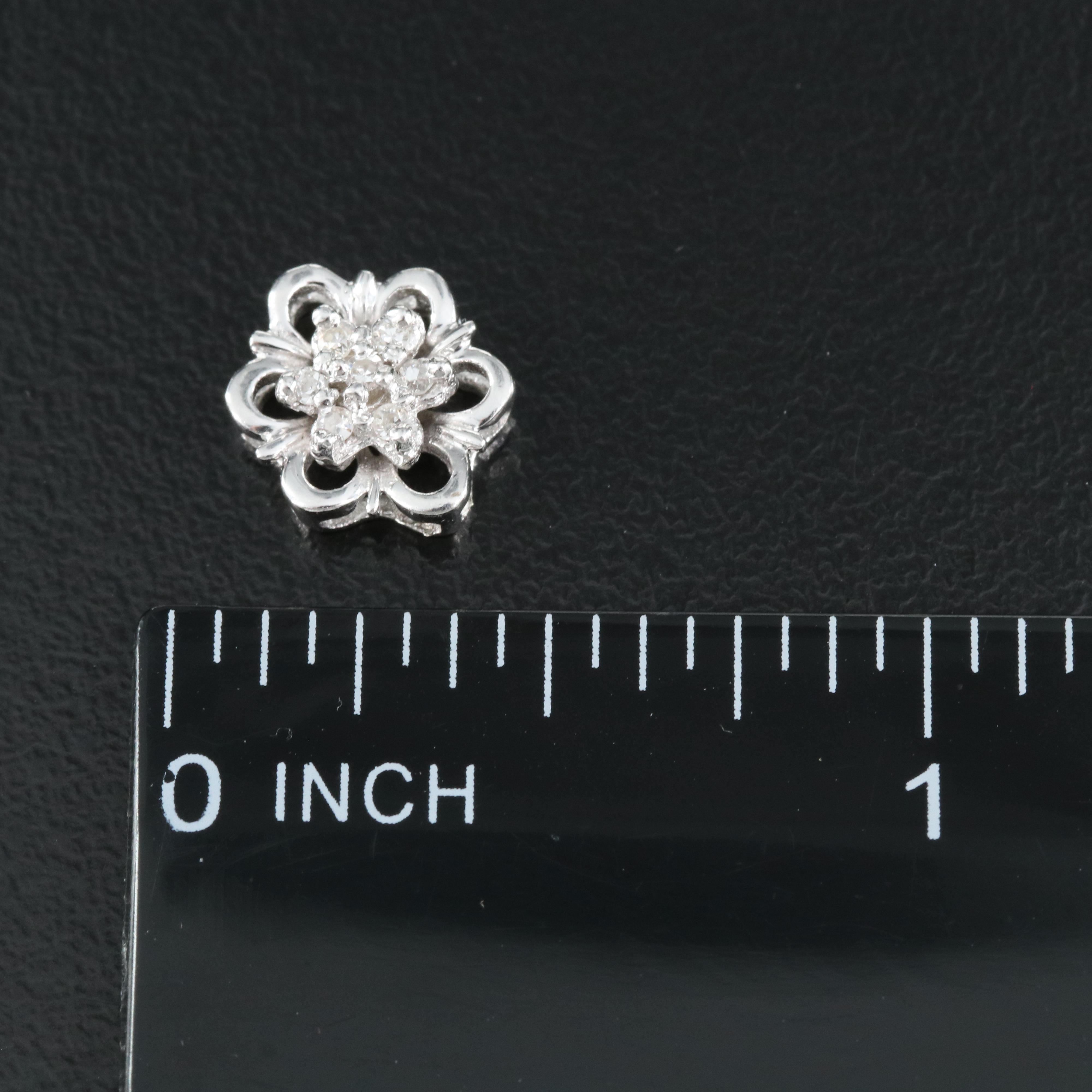 14K 0.07 CTW Diamond Floral Slide Pendant