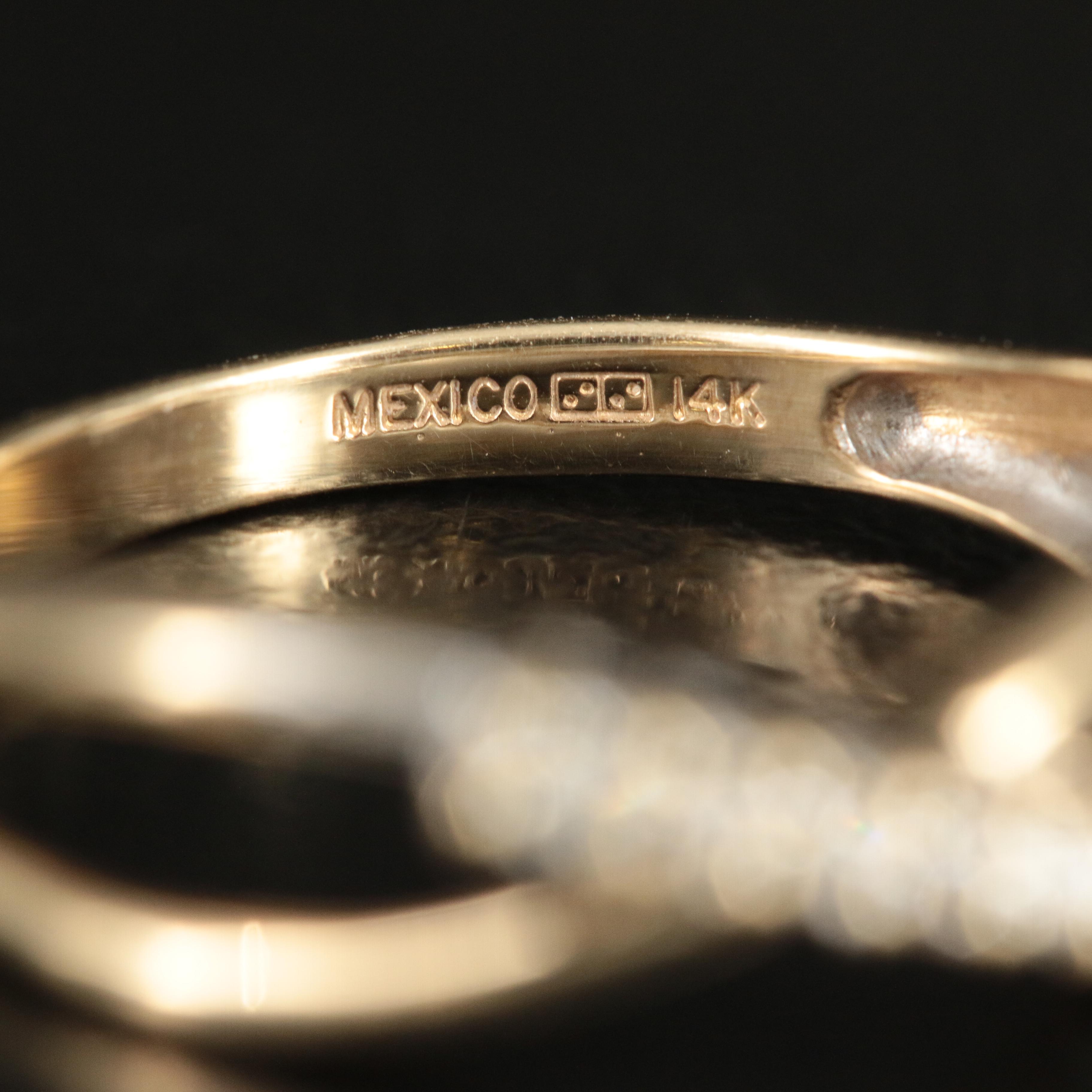 14K 0.10 CT Diamond Ring