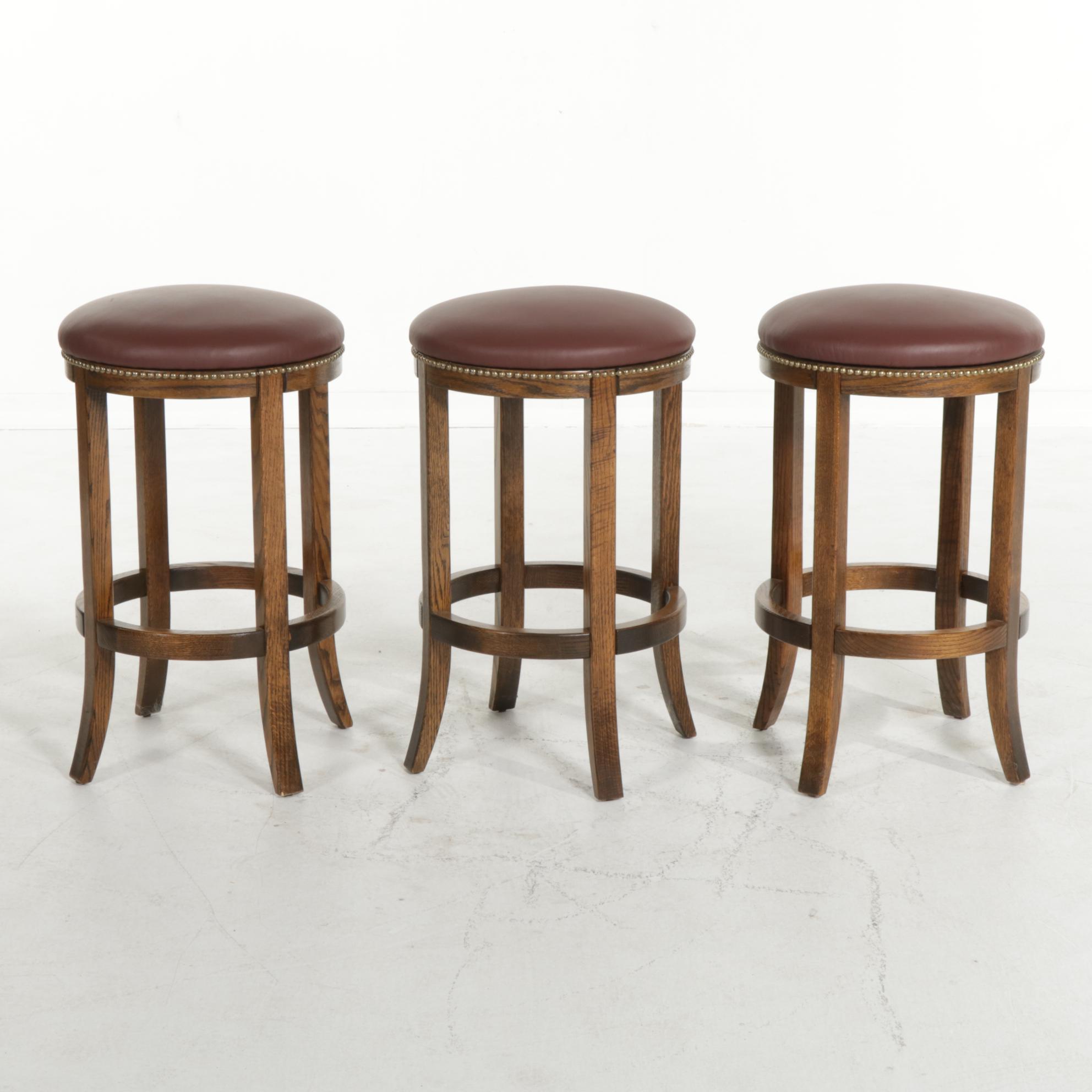 Three Douglas Furniture Oak and Faux Leather Stools EBTH
