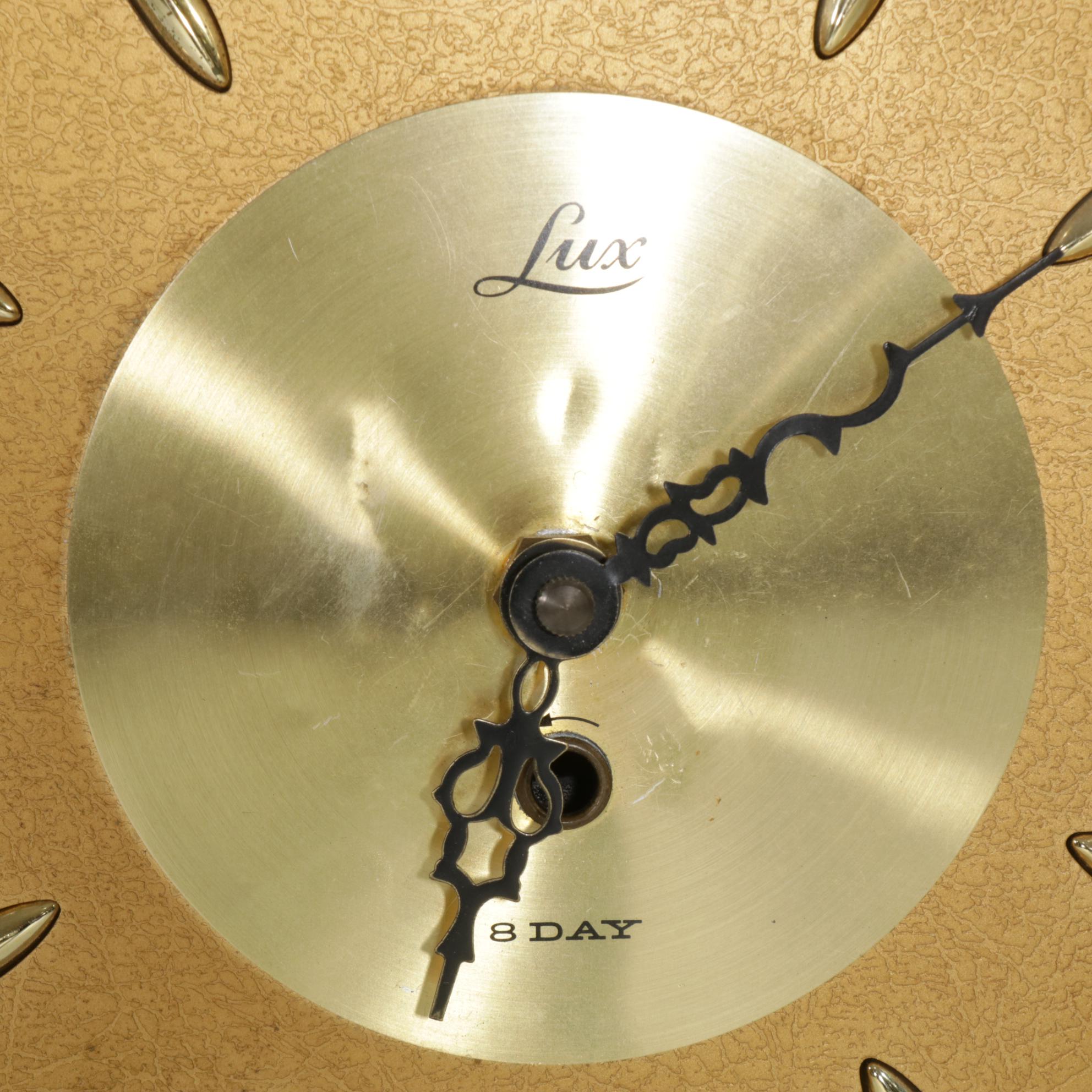 Elgin and Lux Mid Century Modern Sunburst Wall Clocks