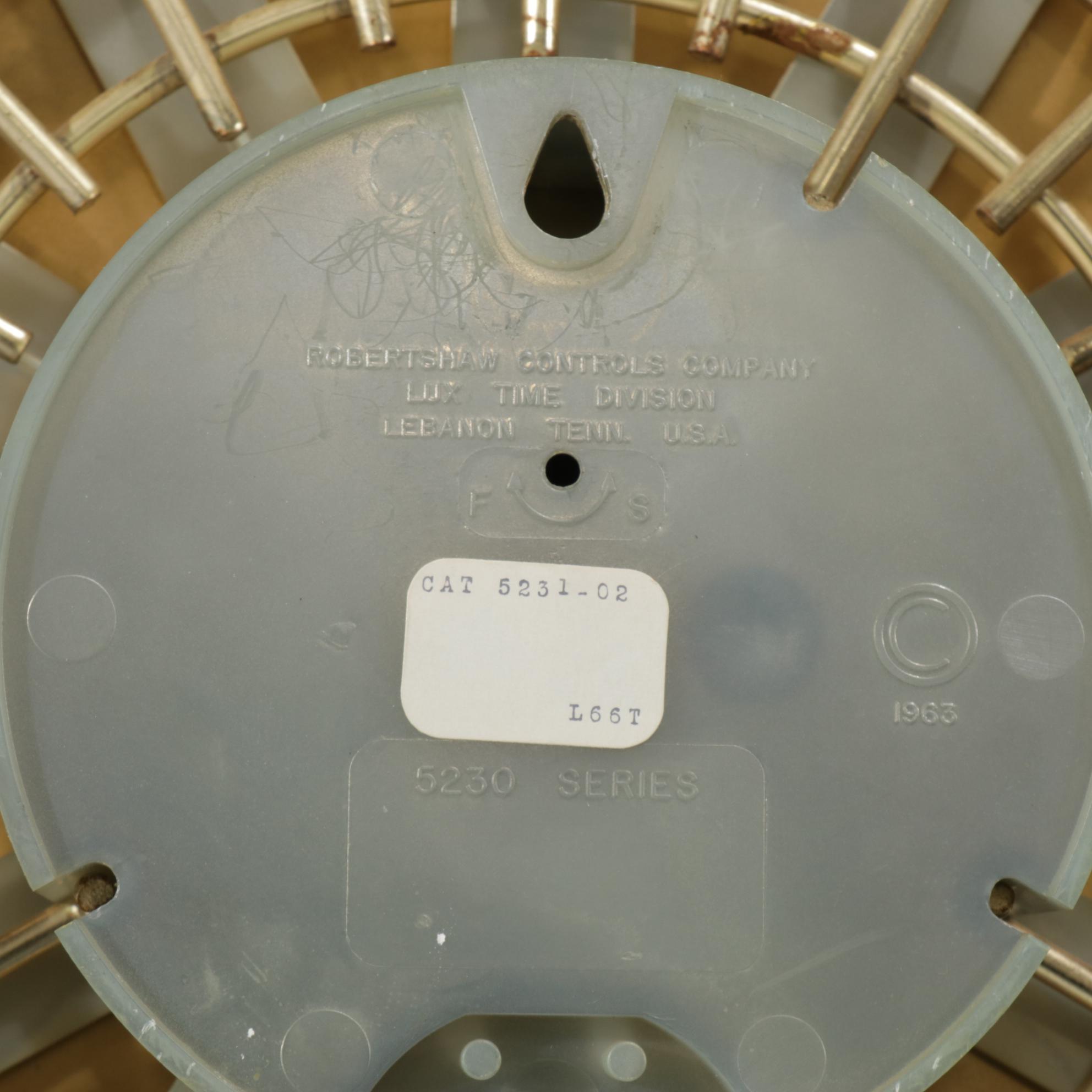 Elgin and Lux Mid Century Modern Sunburst Wall Clocks