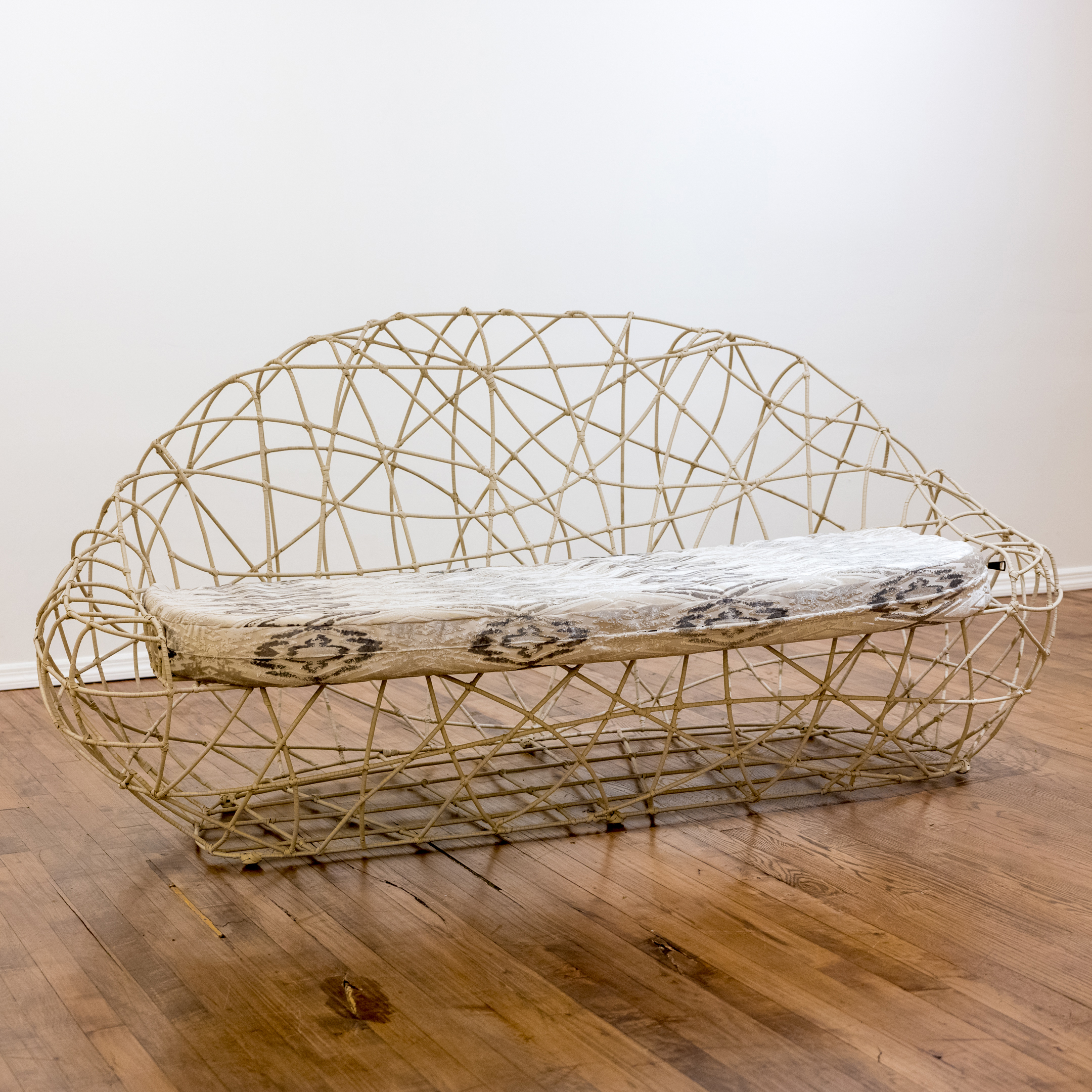 Vinyl Spiral Wrapped Wire Sofa with Ikat Cushion and Accent Pillows