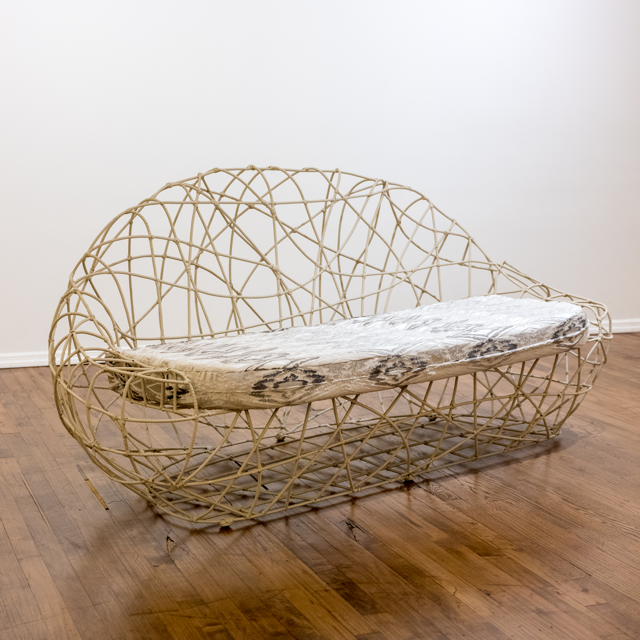 Vinyl Spiral Wrapped Wire Sofa with Ikat Cushion and Accent Pillows