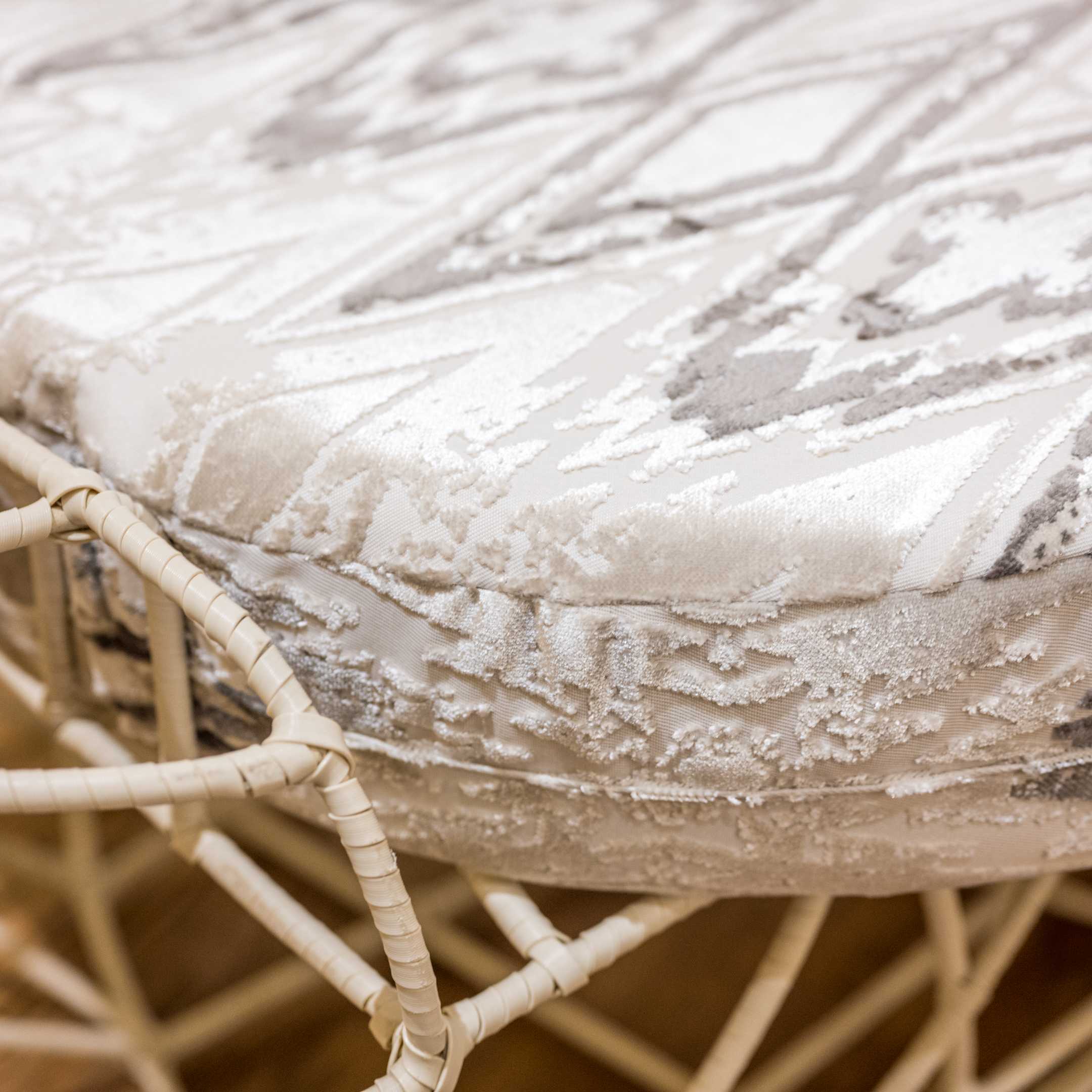 Vinyl Spiral Wrapped Wire Sofa with Ikat Cushion and Accent Pillows