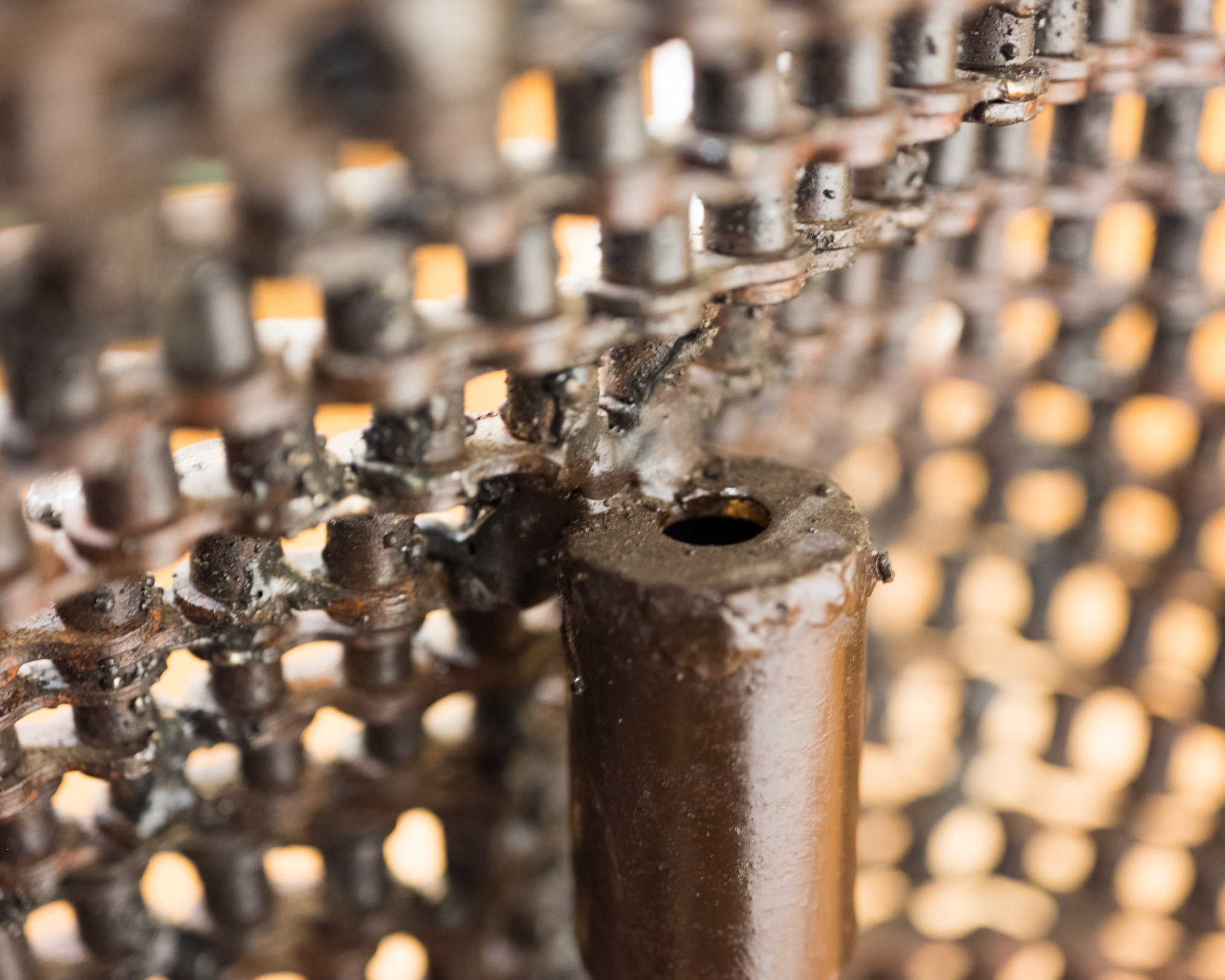 Female-Form Welded Chain Sculpture on Adjustable Stand