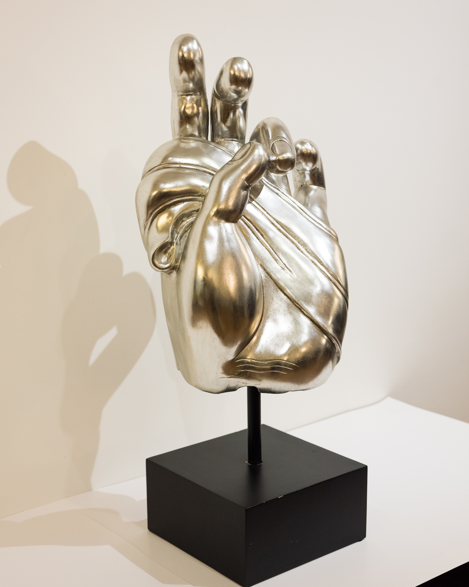 Metal Hand Sculpture on Painted Black Stand, 21st Century