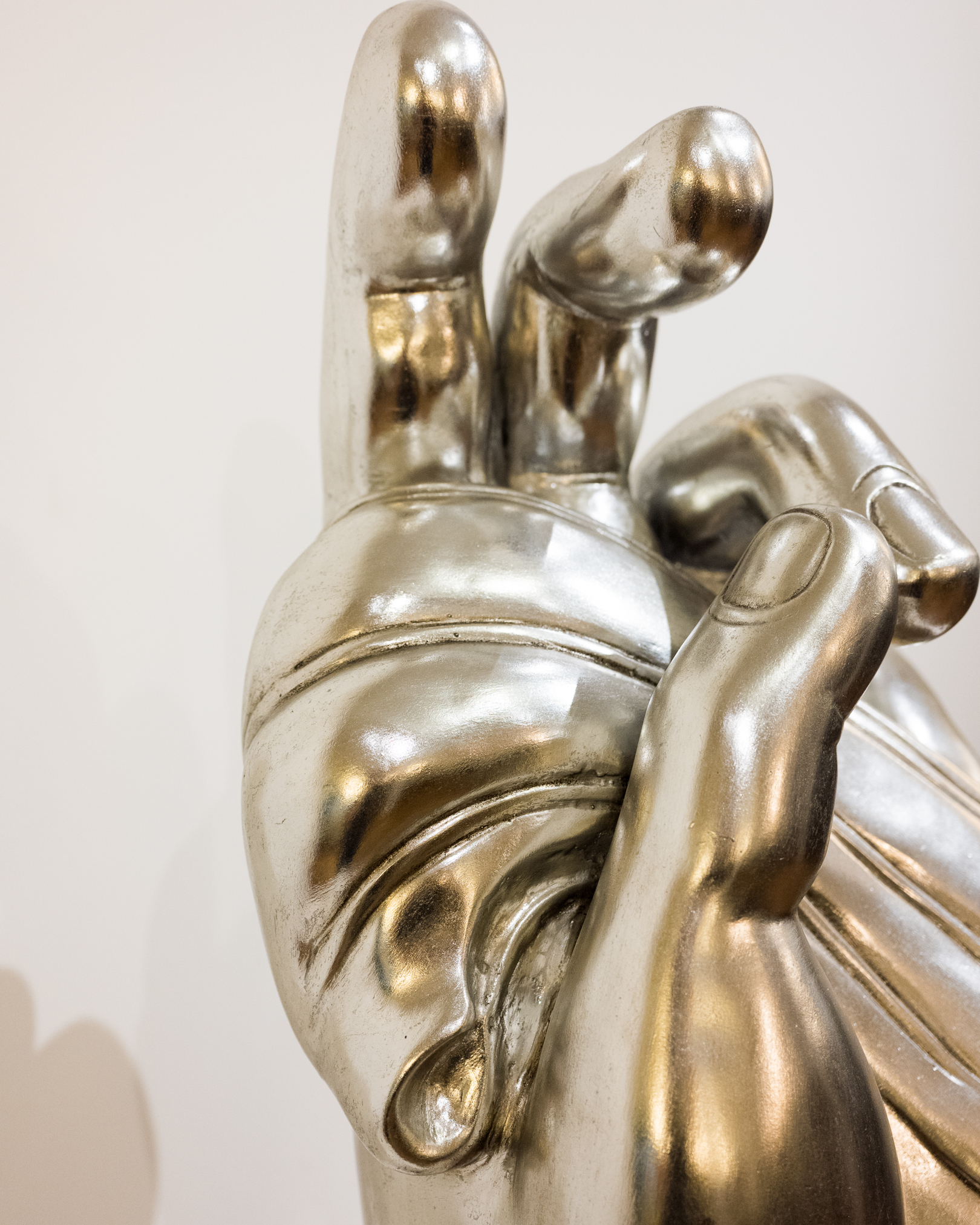 Metal Hand Sculpture on Painted Black Stand, 21st Century
