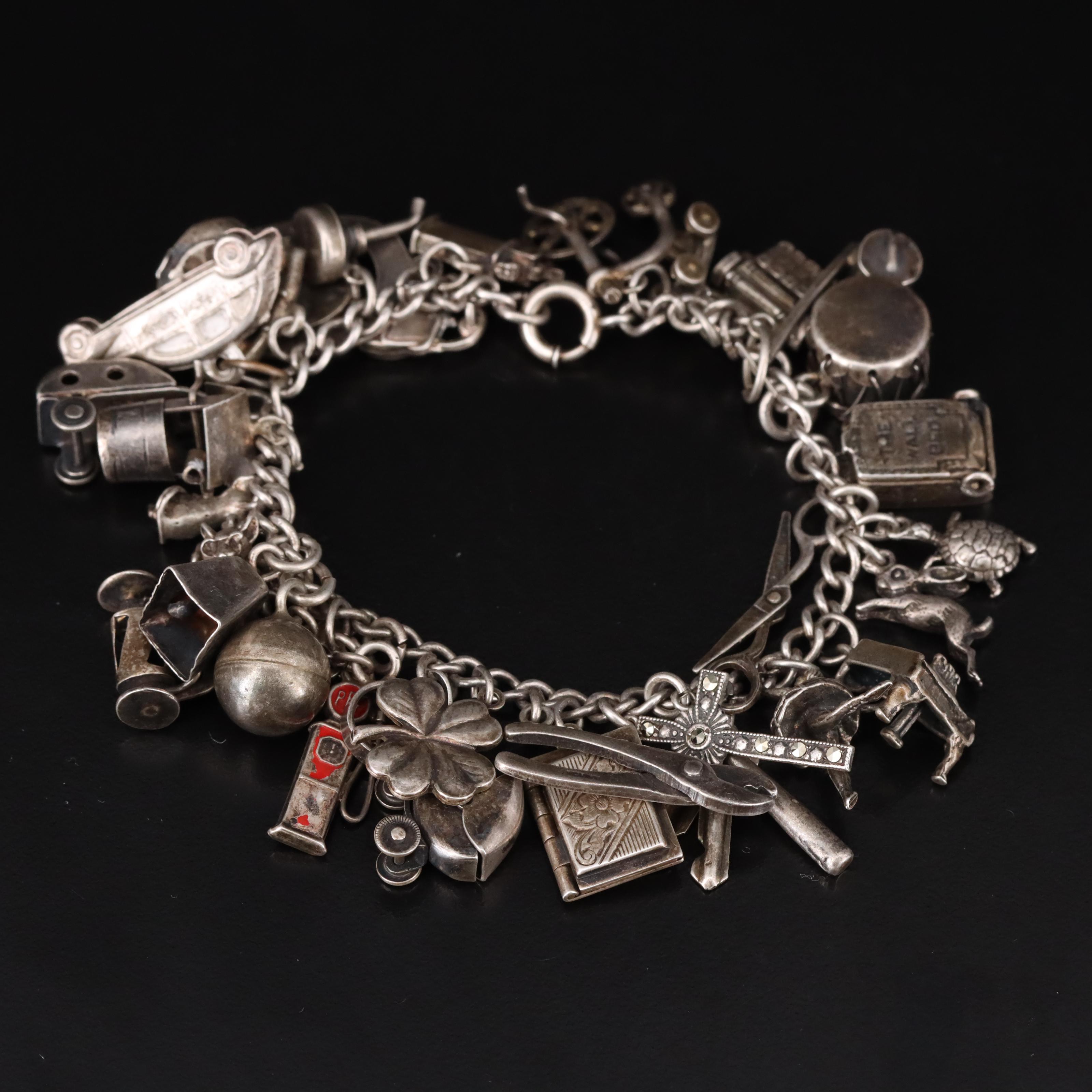 Vintage Sterling Charm Bracelet Including Articulated EBTH