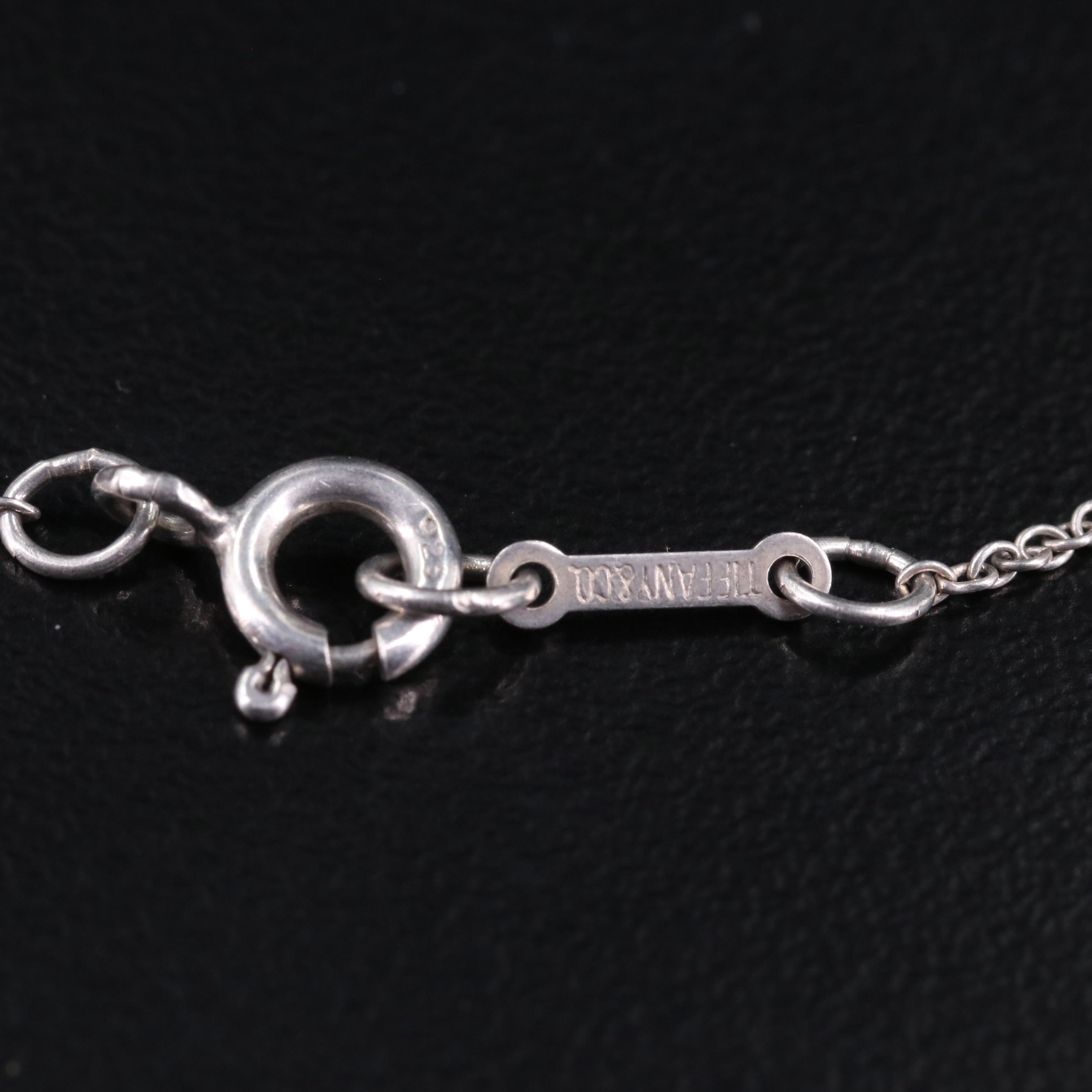 Elsa Peretti for Tiffany & Co.  Sterling "Infinity Cross" Pendant Necklace