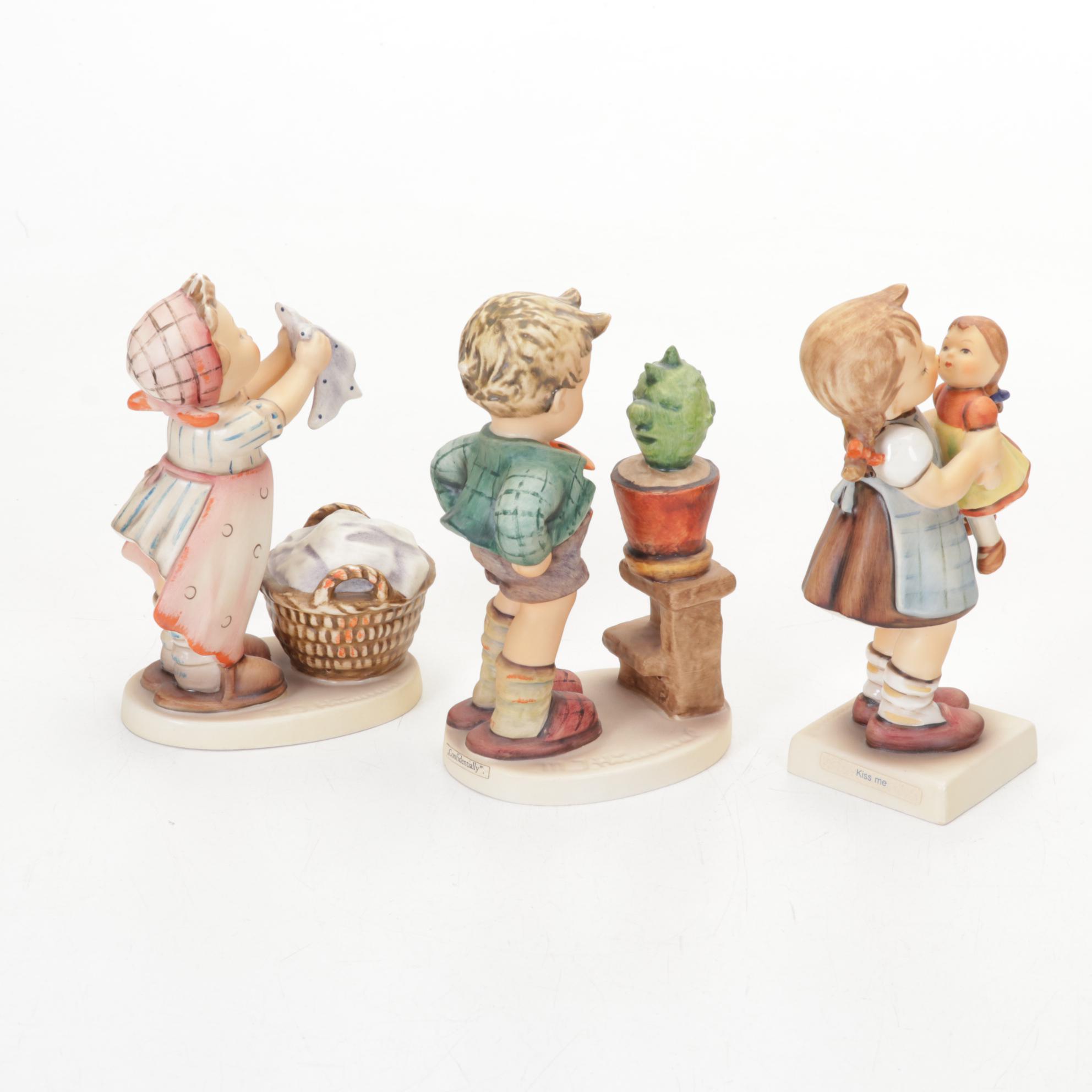 Goebel Hummel Porcelain Figurines Featuring Authorized Dealer Advertising Plaque
