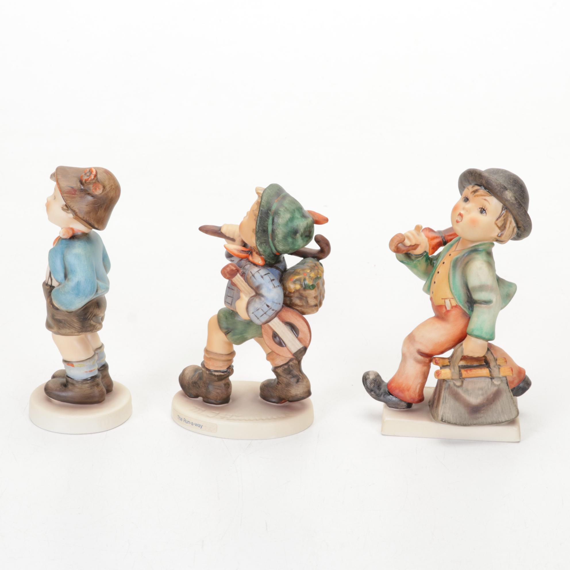 Goebel Hummel Porcelain Figurines Featuring Authorized Dealer Advertising Plaque
