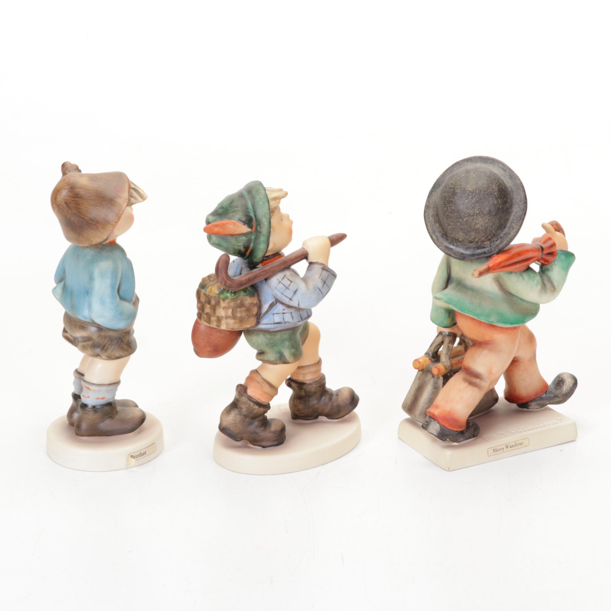 Goebel Hummel Porcelain Figurines Featuring Authorized Dealer Advertising Plaque