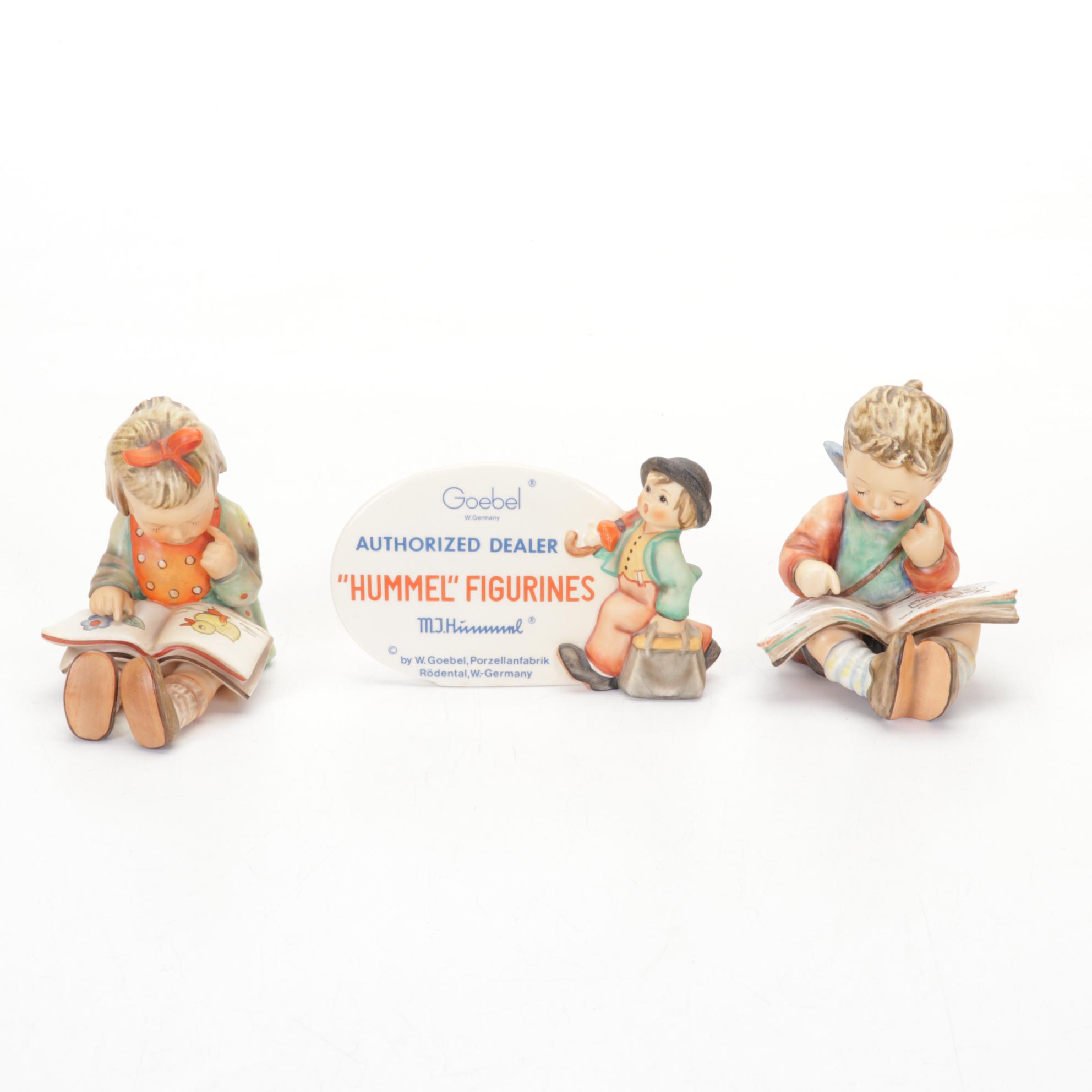 Goebel Hummel Porcelain Figurines Featuring Authorized Dealer Advertising Plaque
