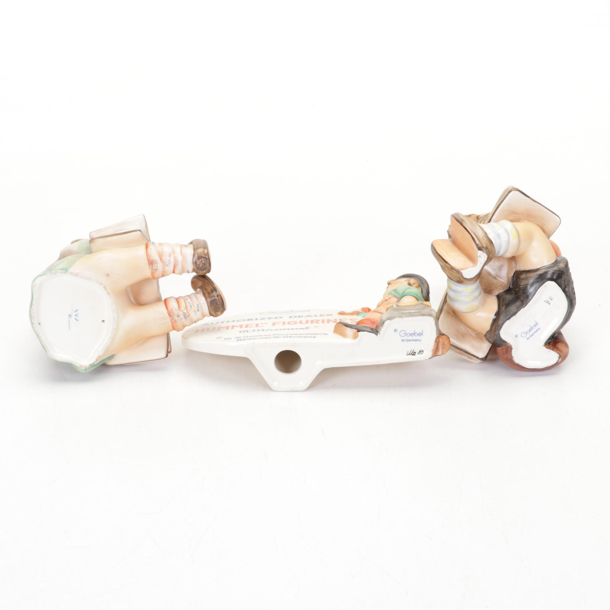 Goebel Hummel Porcelain Figurines Featuring Authorized Dealer Advertising Plaque