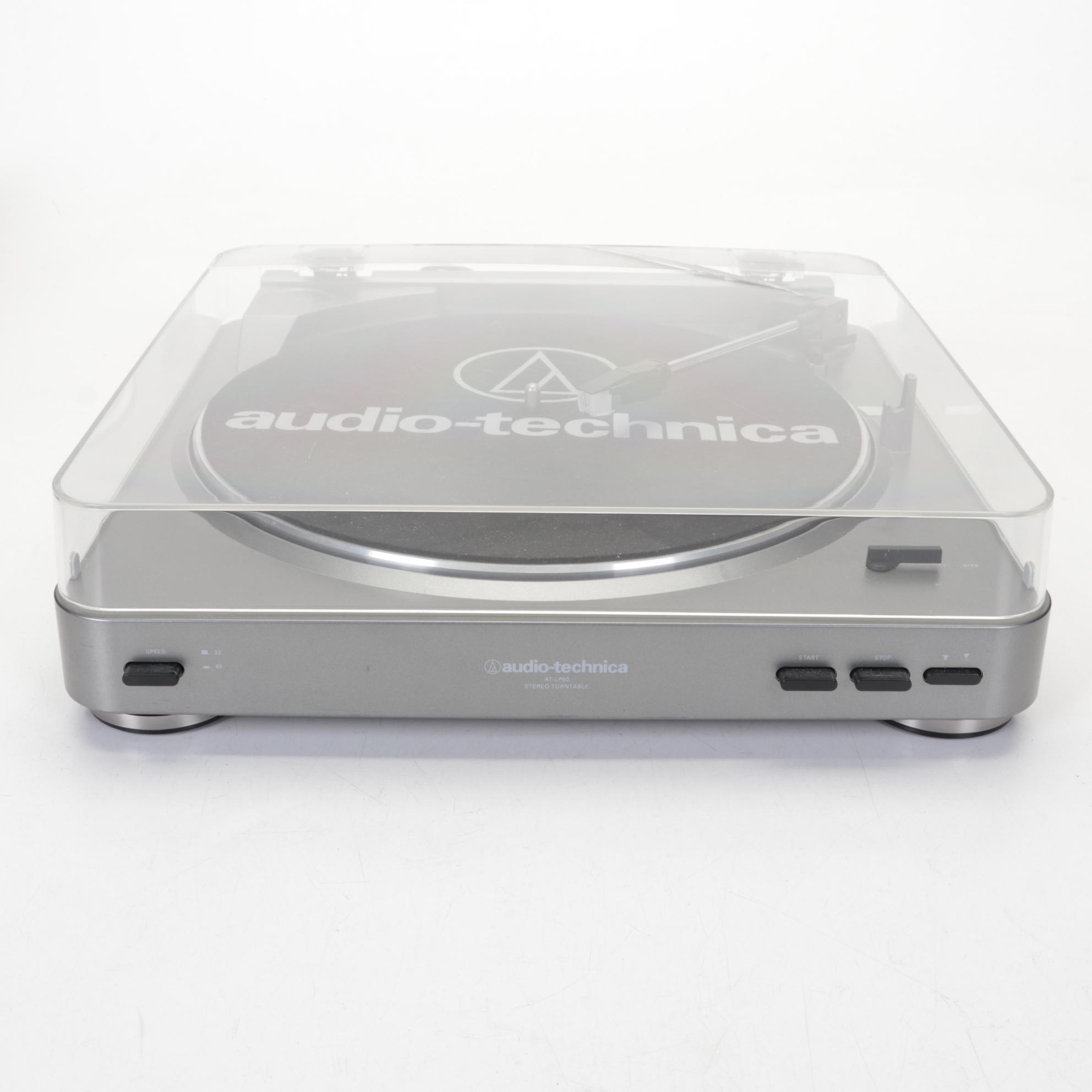 Audio-Technica Record Player With Vizio Soundbar and Two Remotes