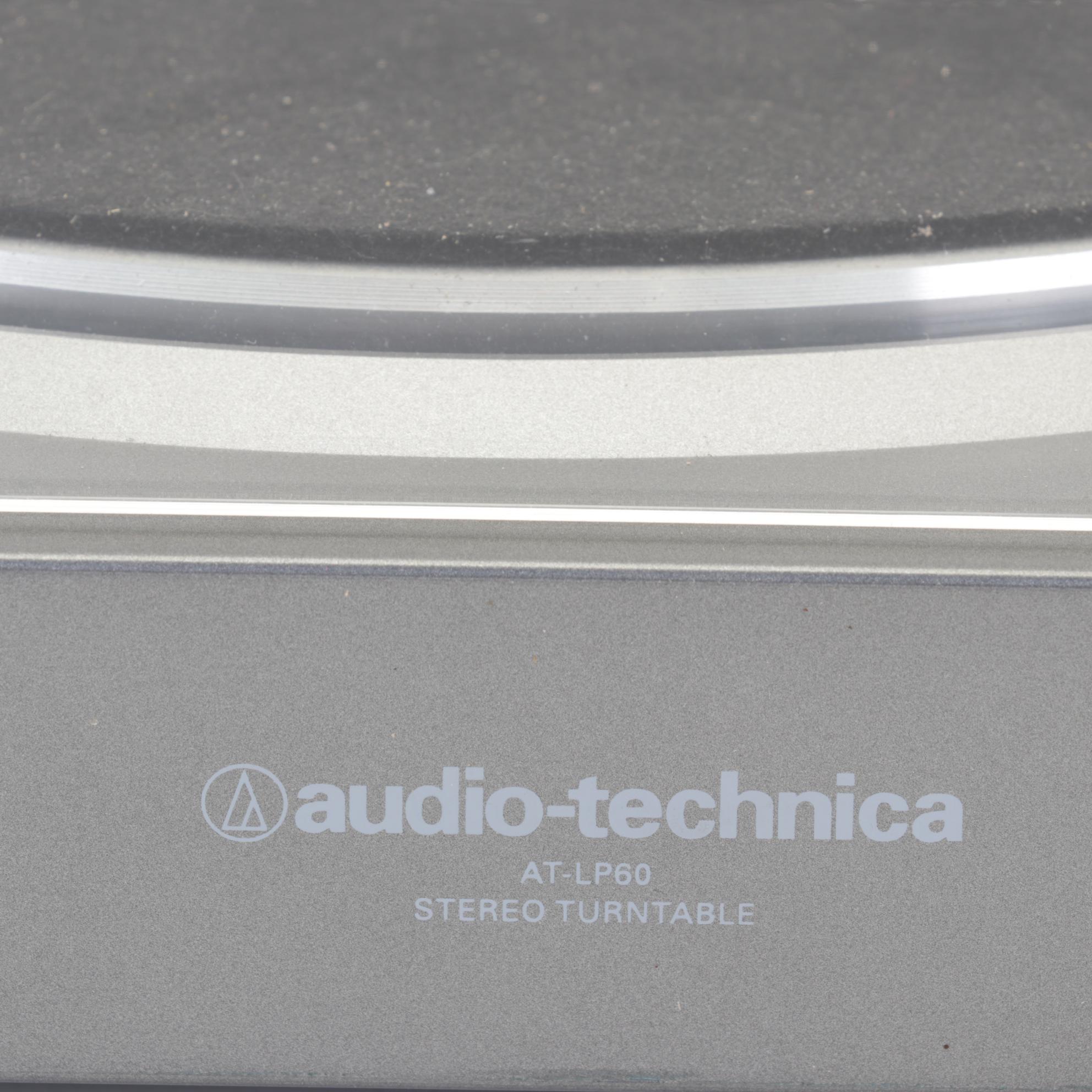 Audio-Technica Record Player With Vizio Soundbar and Two Remotes