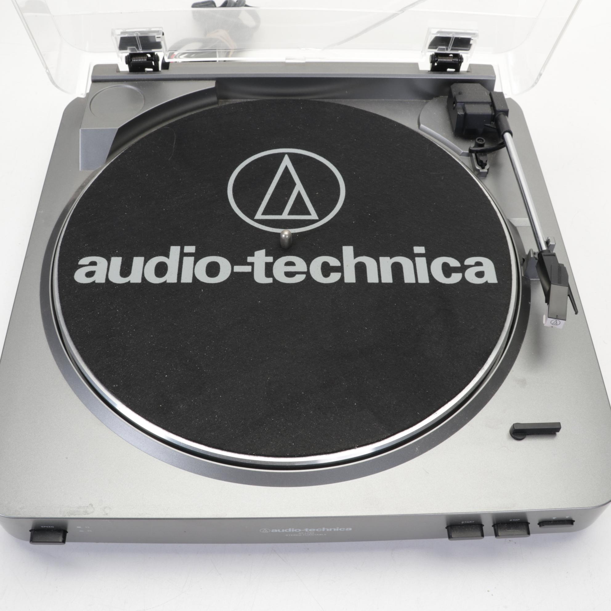 Audio-Technica Record Player With Vizio Soundbar and Two Remotes