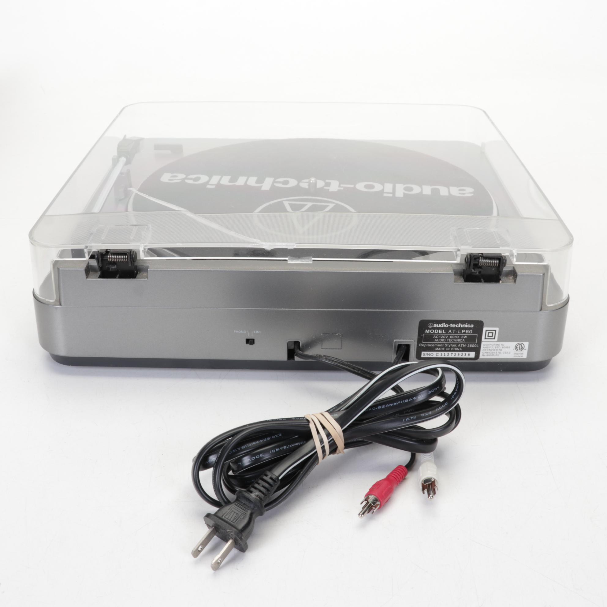 Audio-Technica Record Player With Vizio Soundbar and Two Remotes