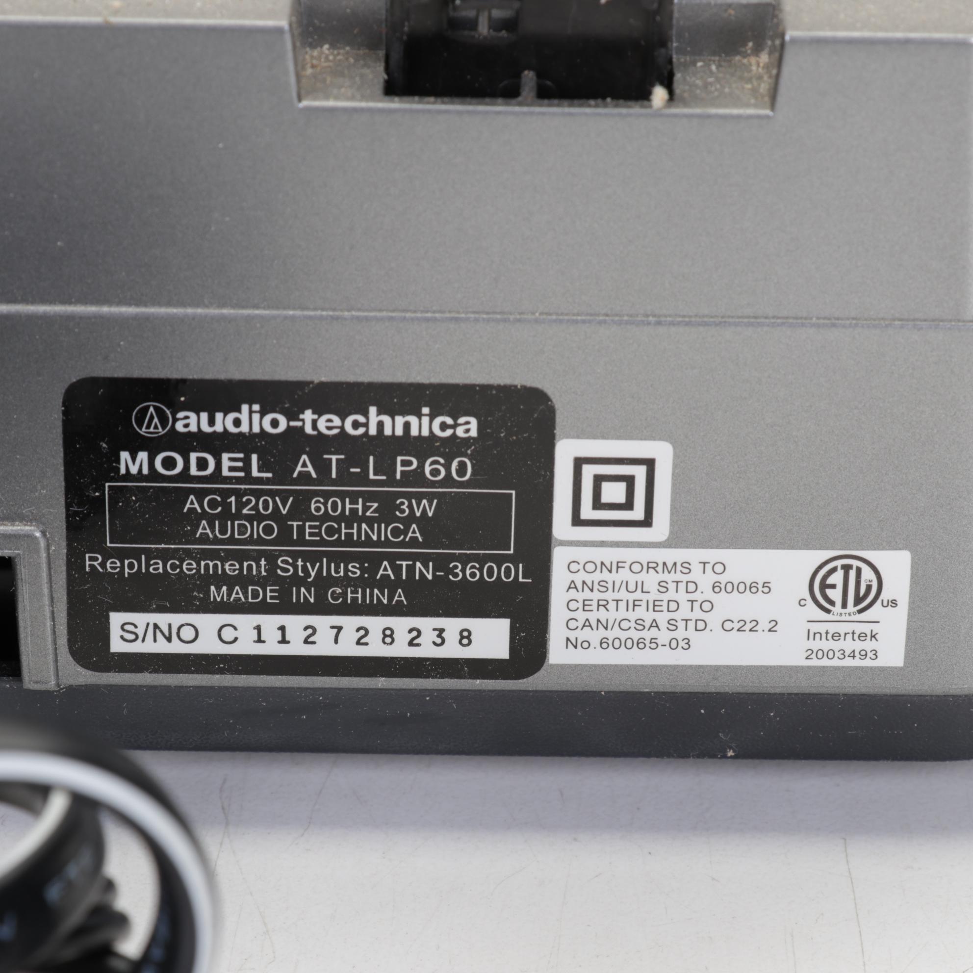 Audio-Technica Record Player With Vizio Soundbar and Two Remotes