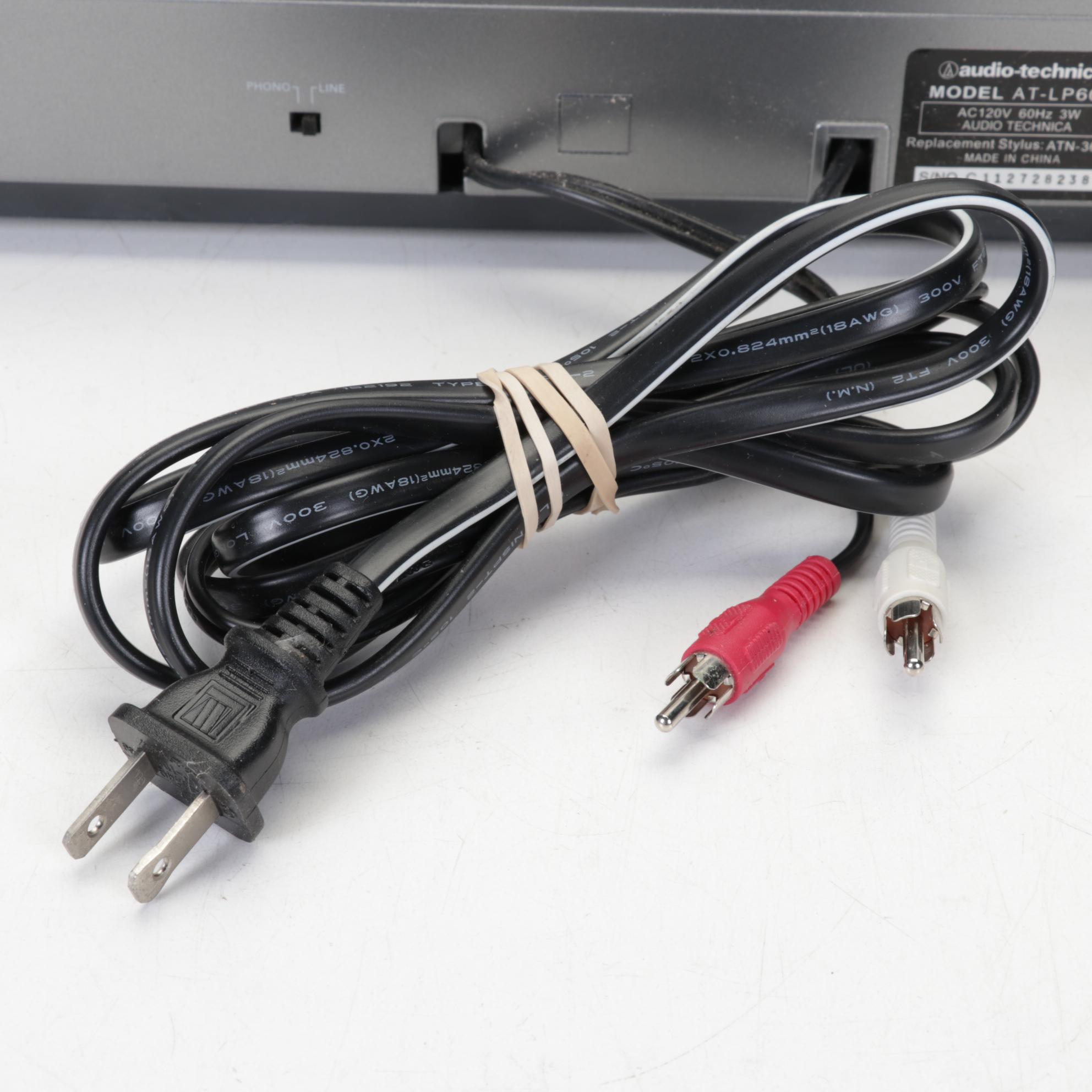 Audio-Technica Record Player With Vizio Soundbar and Two Remotes