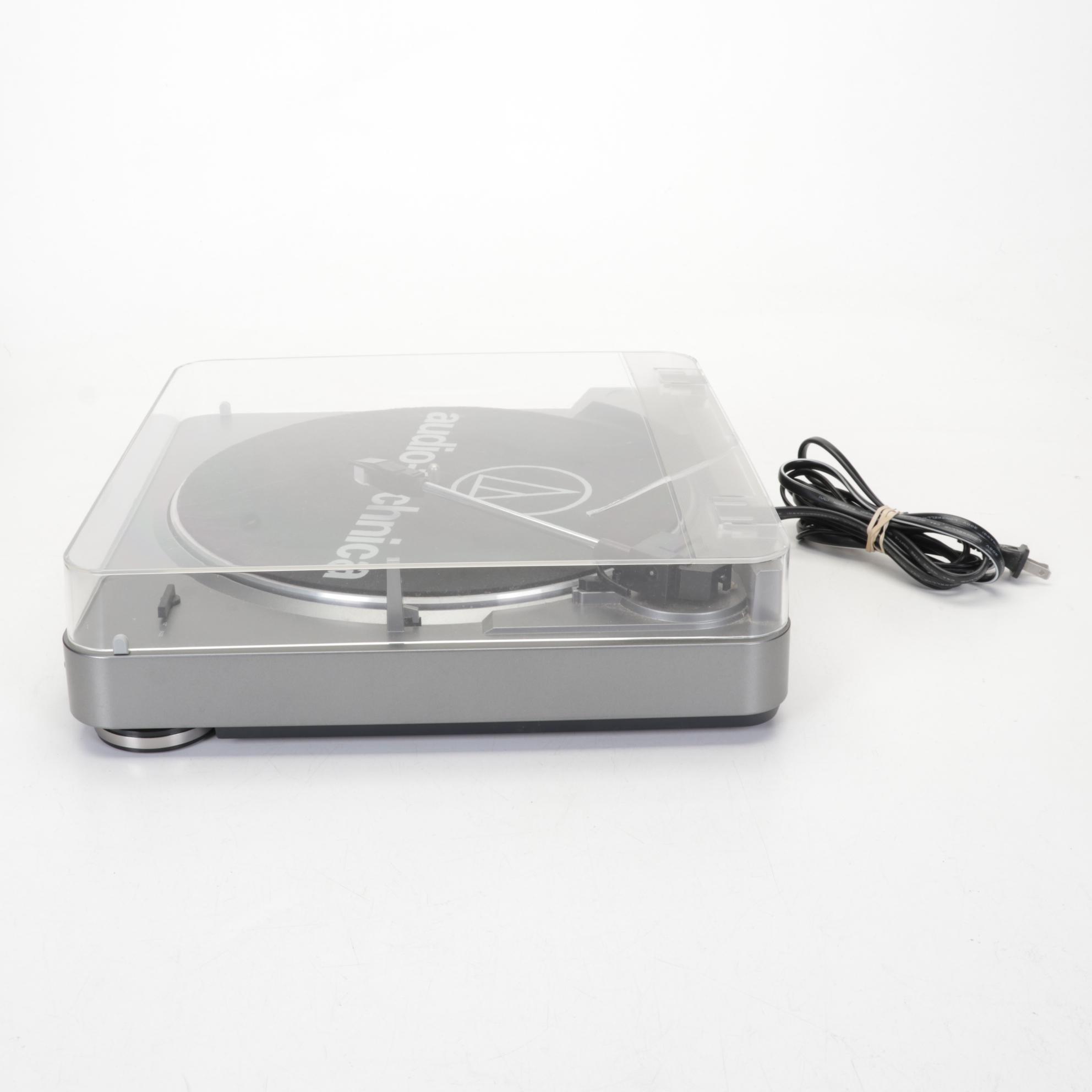 Audio-Technica Record Player With Vizio Soundbar and Two Remotes