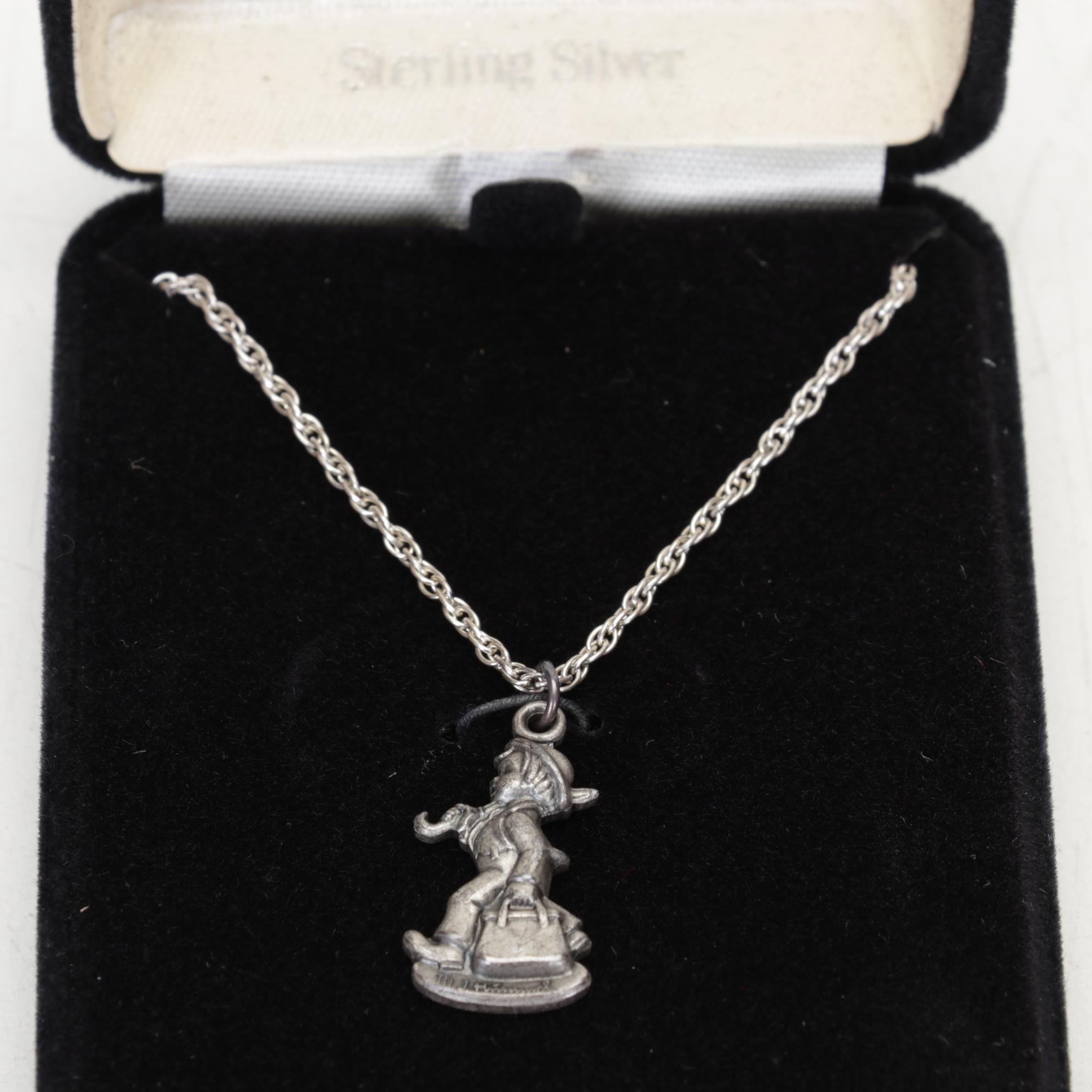 Hummel with Other Goebel Figurines and Collectibles