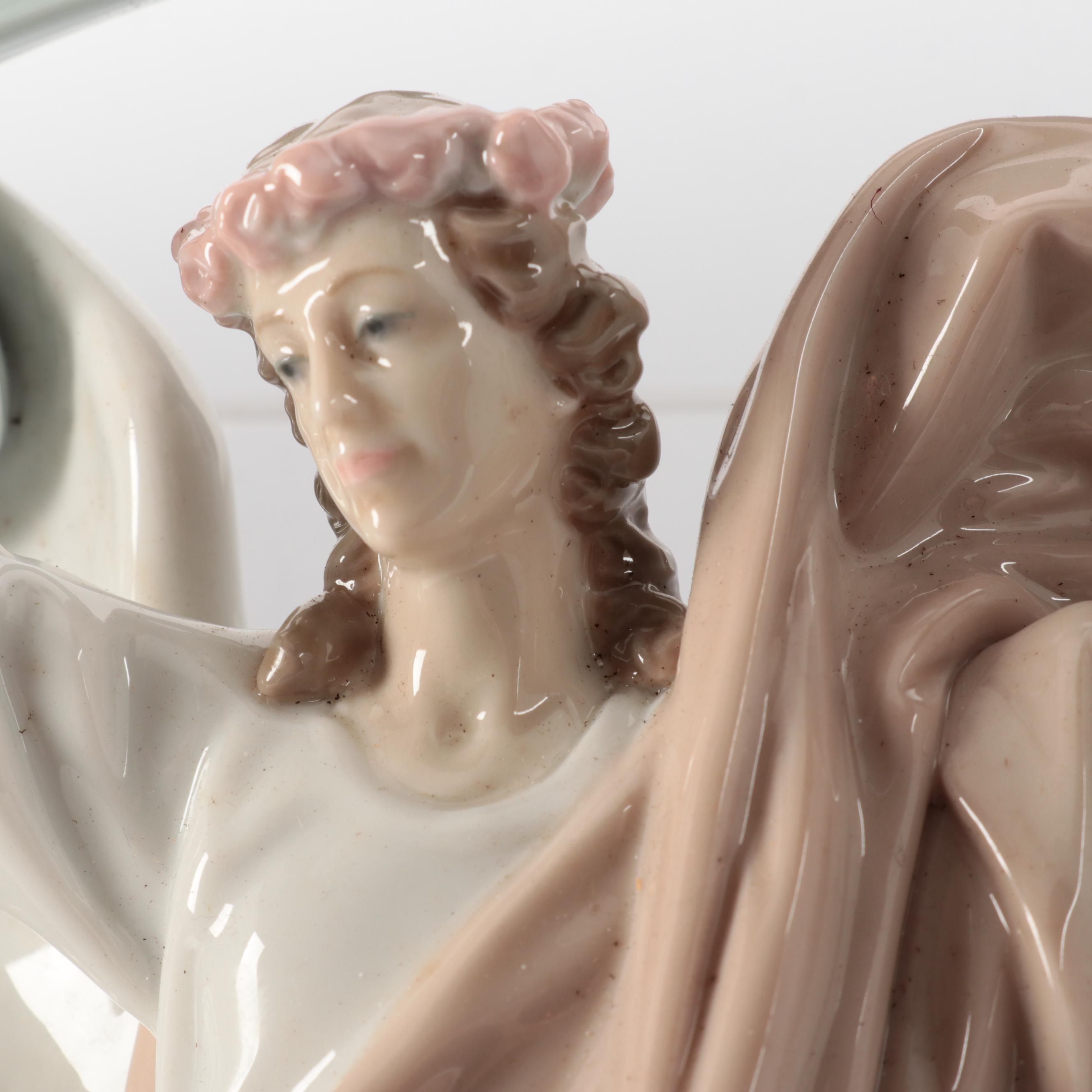 Lladró "The Loving Family" and "Gabriel the Archangel" Porcelain Figurines