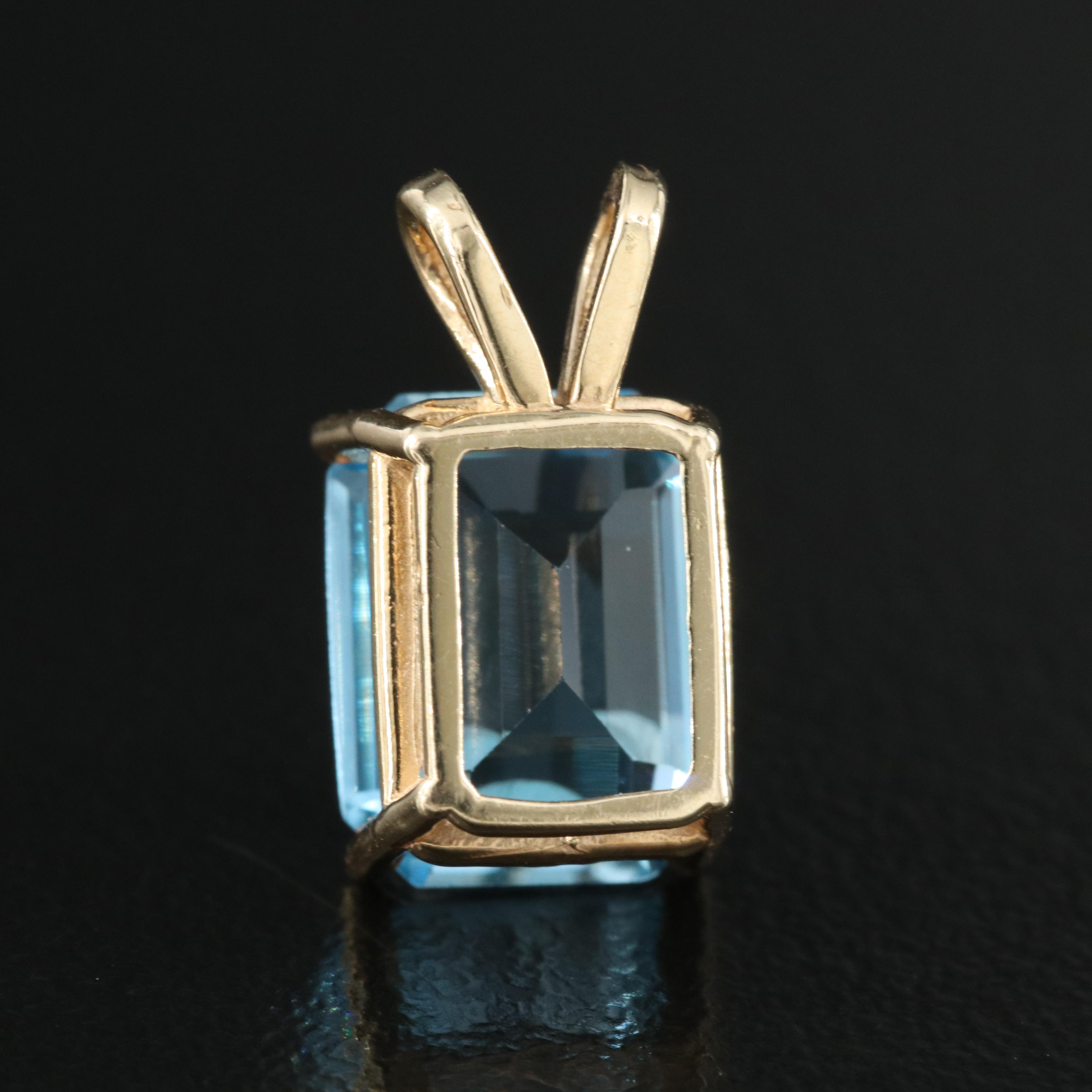 10K Swiss Blue Topaz Solitaire Pendant