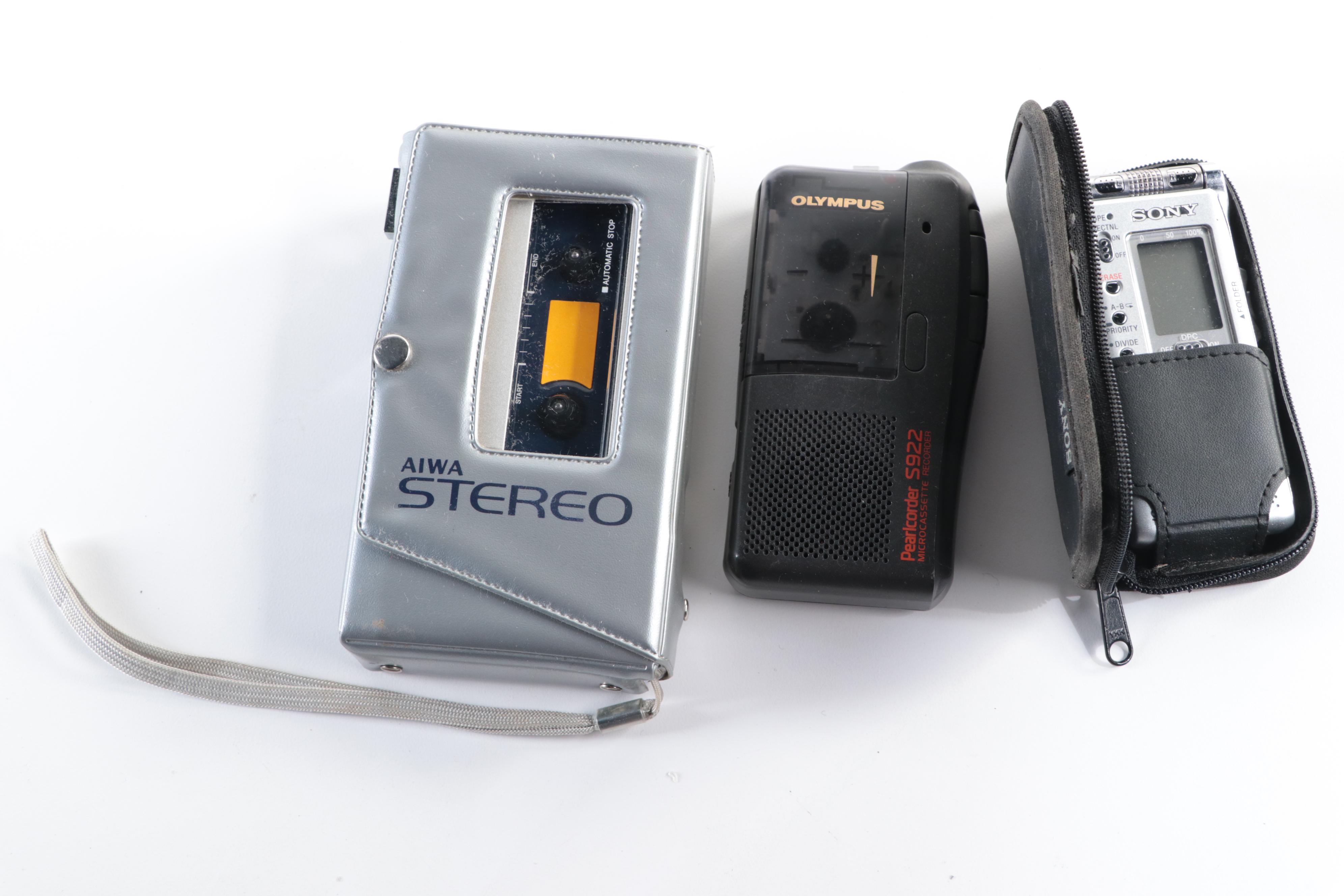 Olympus and Other Dictation Machines and Walkmans with Headphones