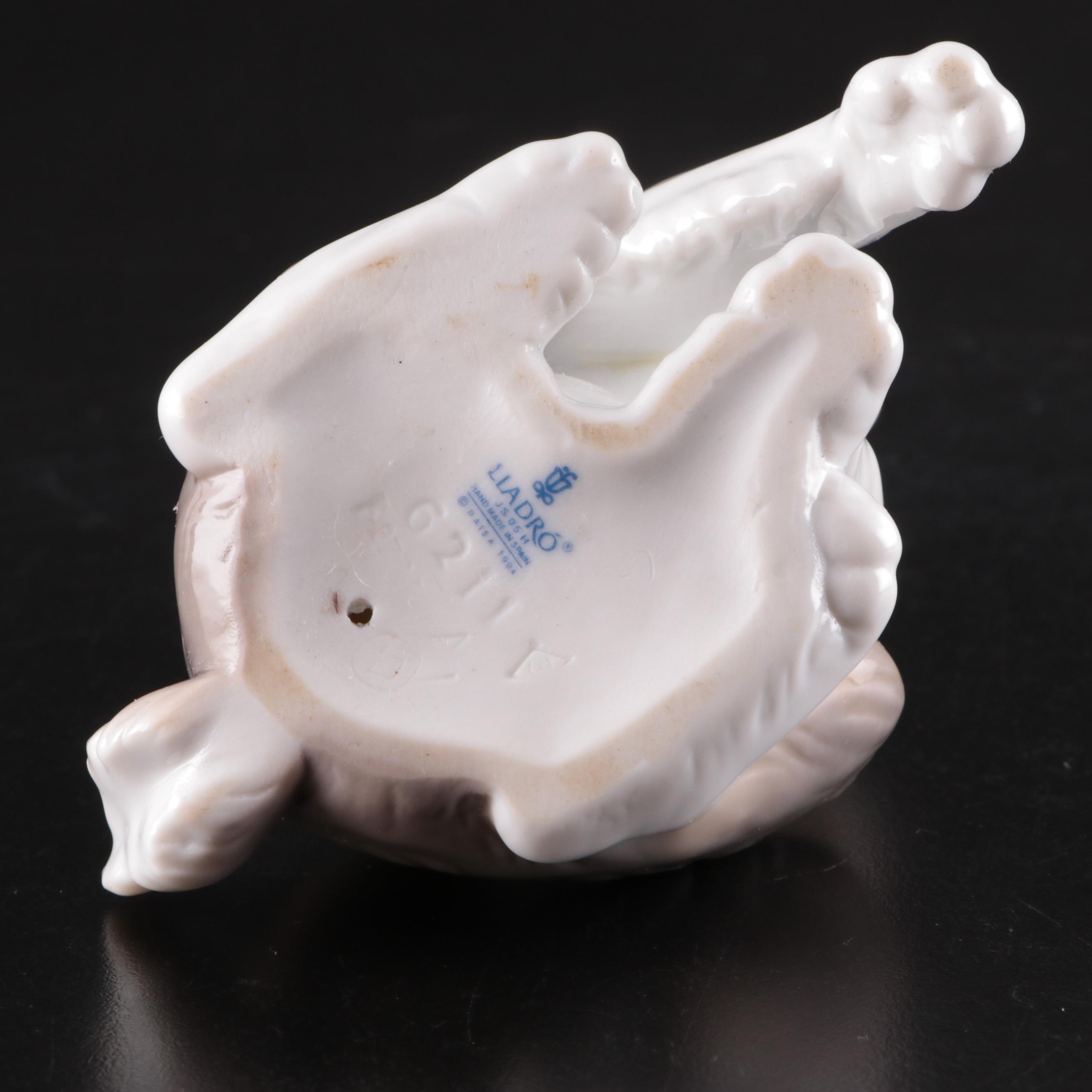 Lladró "New Friend" and "Take Me Home" Porcelain Figurines