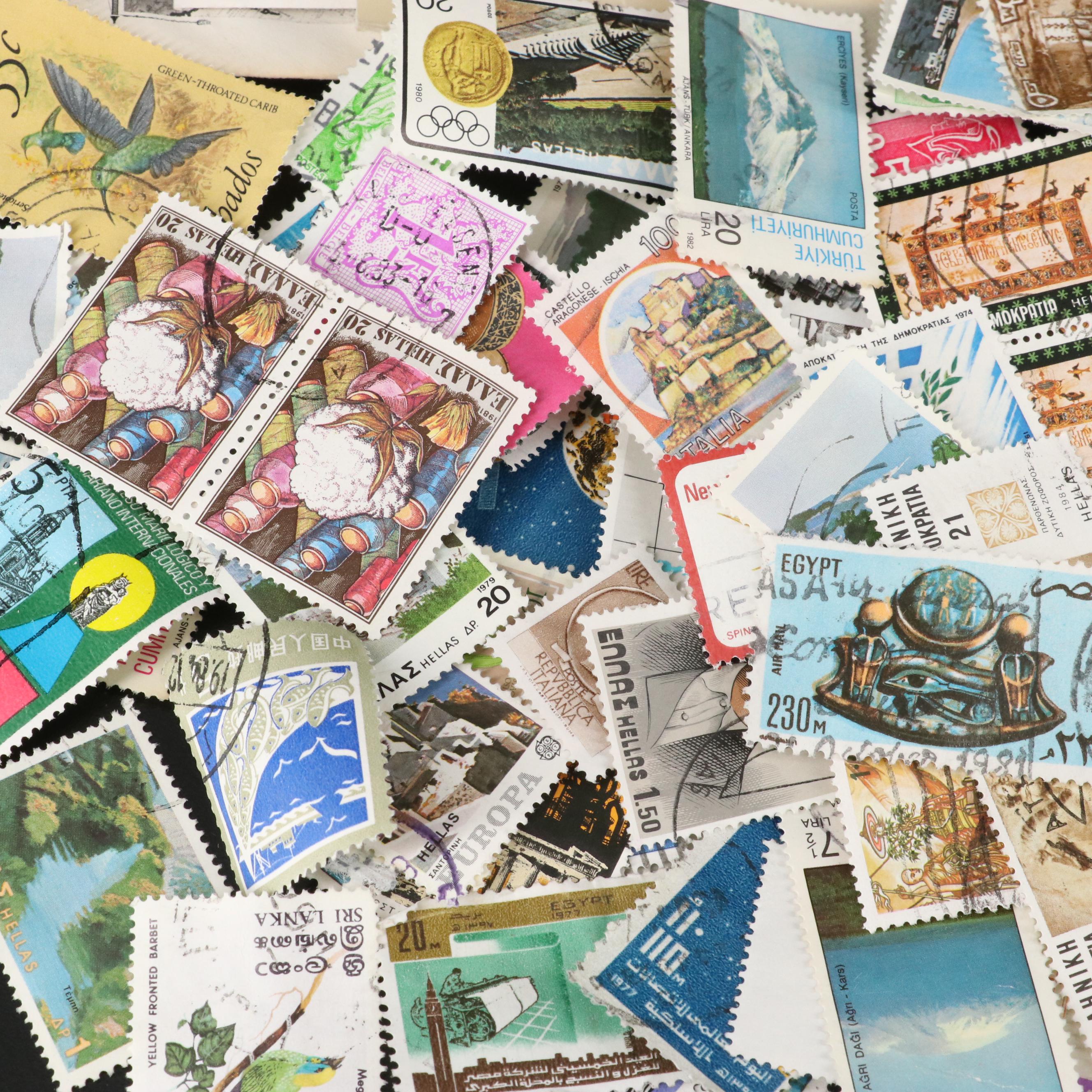 Large Assortment of Foreign Postage Stamps and a U.S. Mint Coin Proof Set