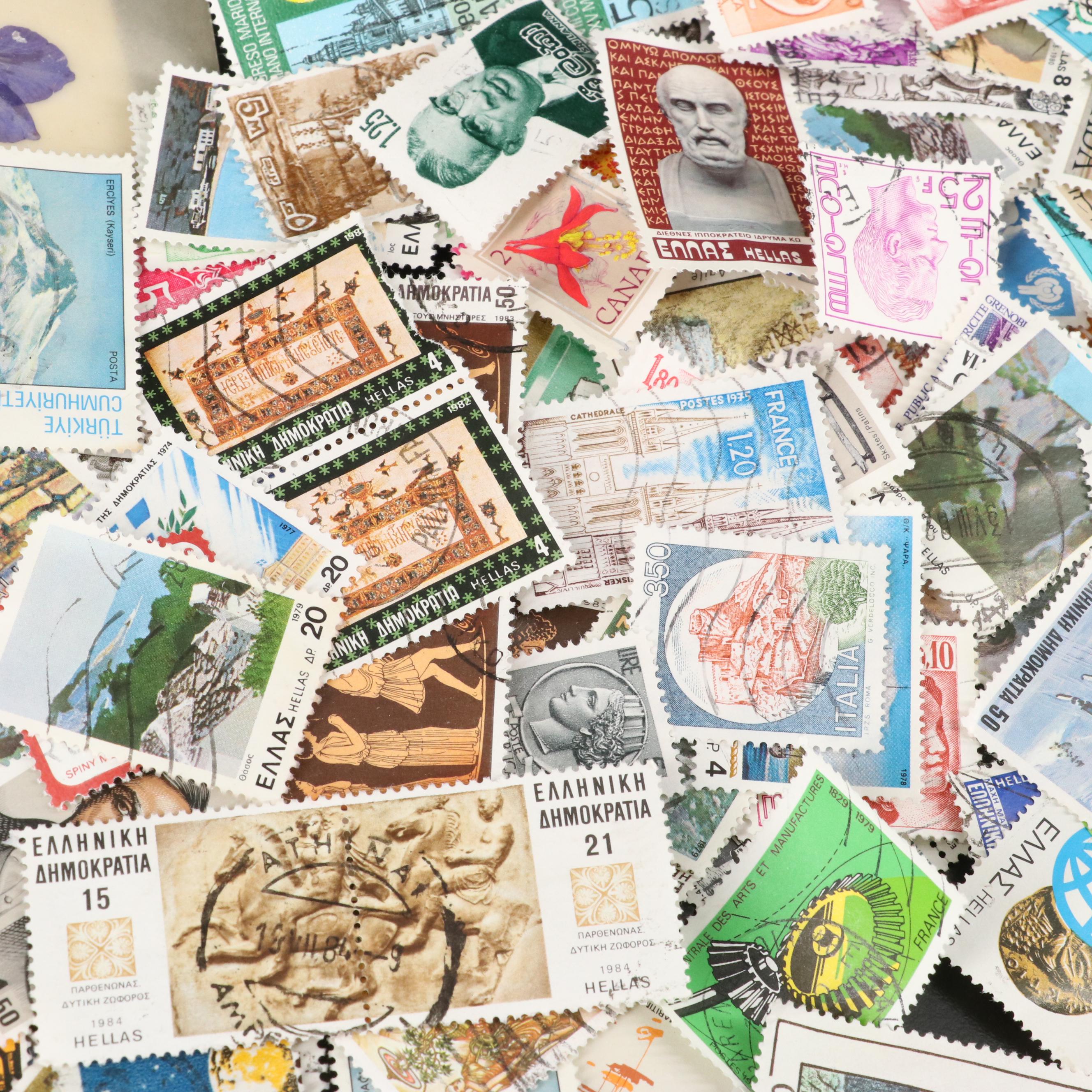 Large Assortment of Foreign Postage Stamps and a U.S. Mint Coin Proof Set