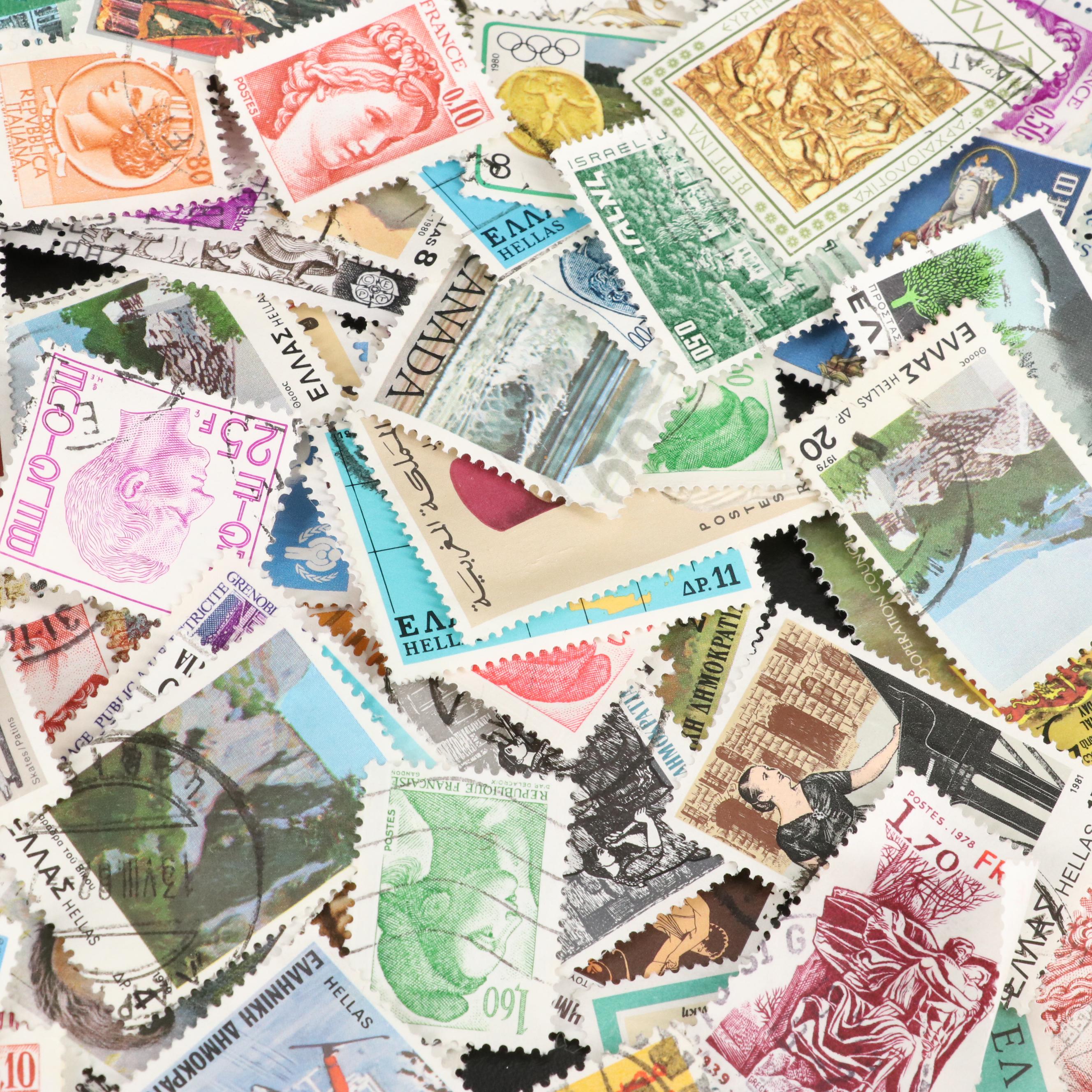 Large Assortment of Foreign Postage Stamps and a U.S. Mint Coin Proof Set