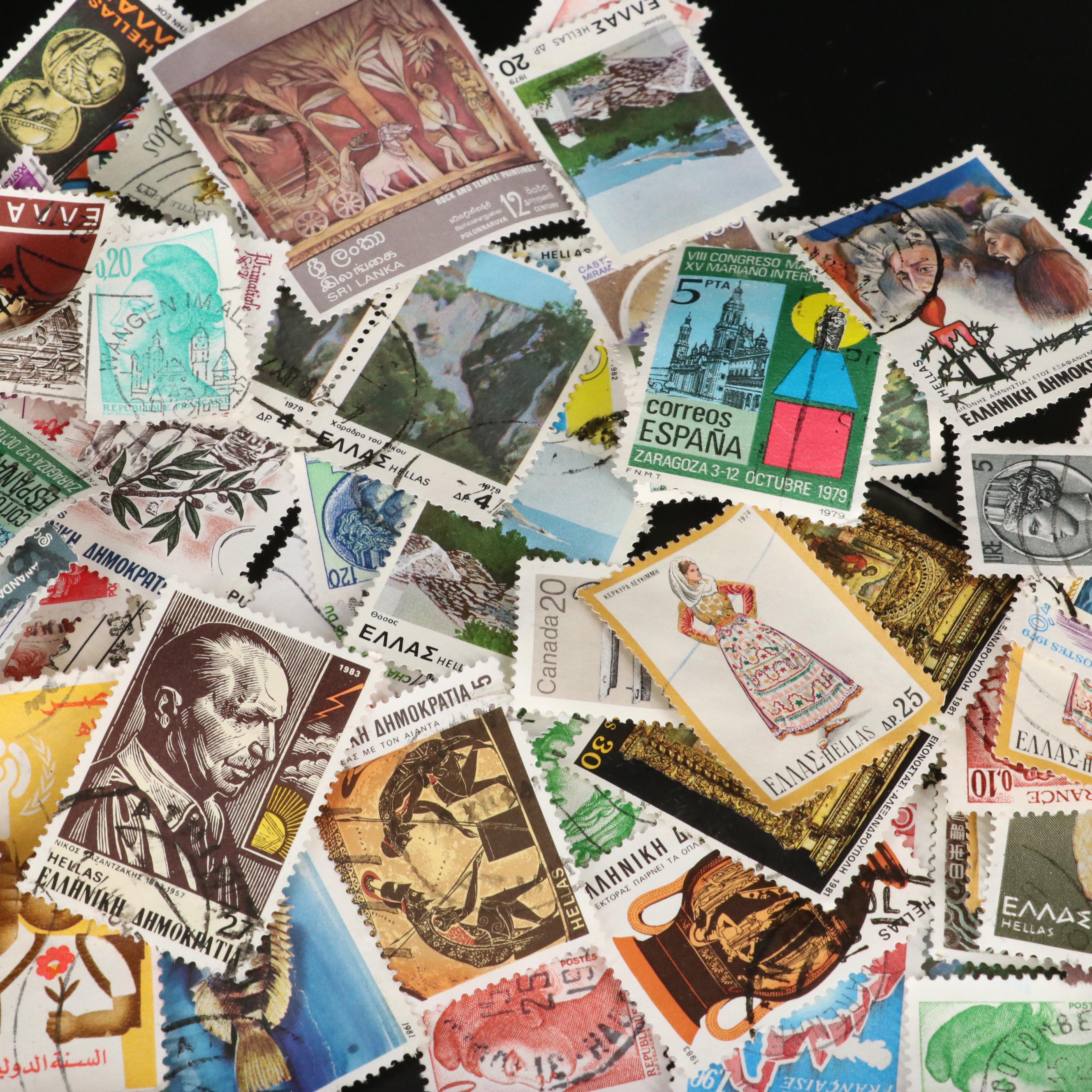 Large Assortment of Foreign Postage Stamps and a U.S. Mint Coin Proof Set