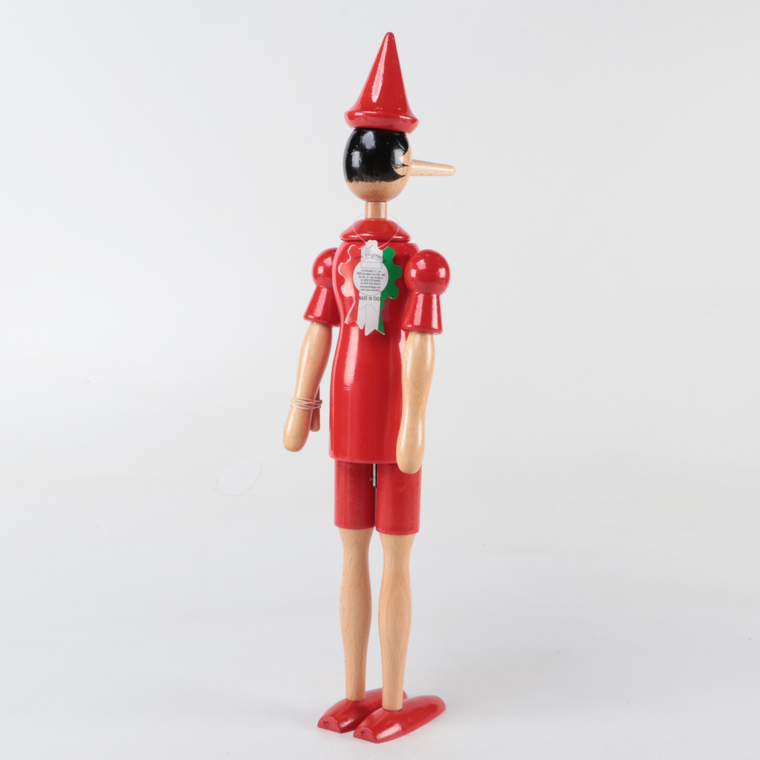 Steinbach Folk Art Wood Nutcracker with Rainoldi Wood Pinocchio Figurines