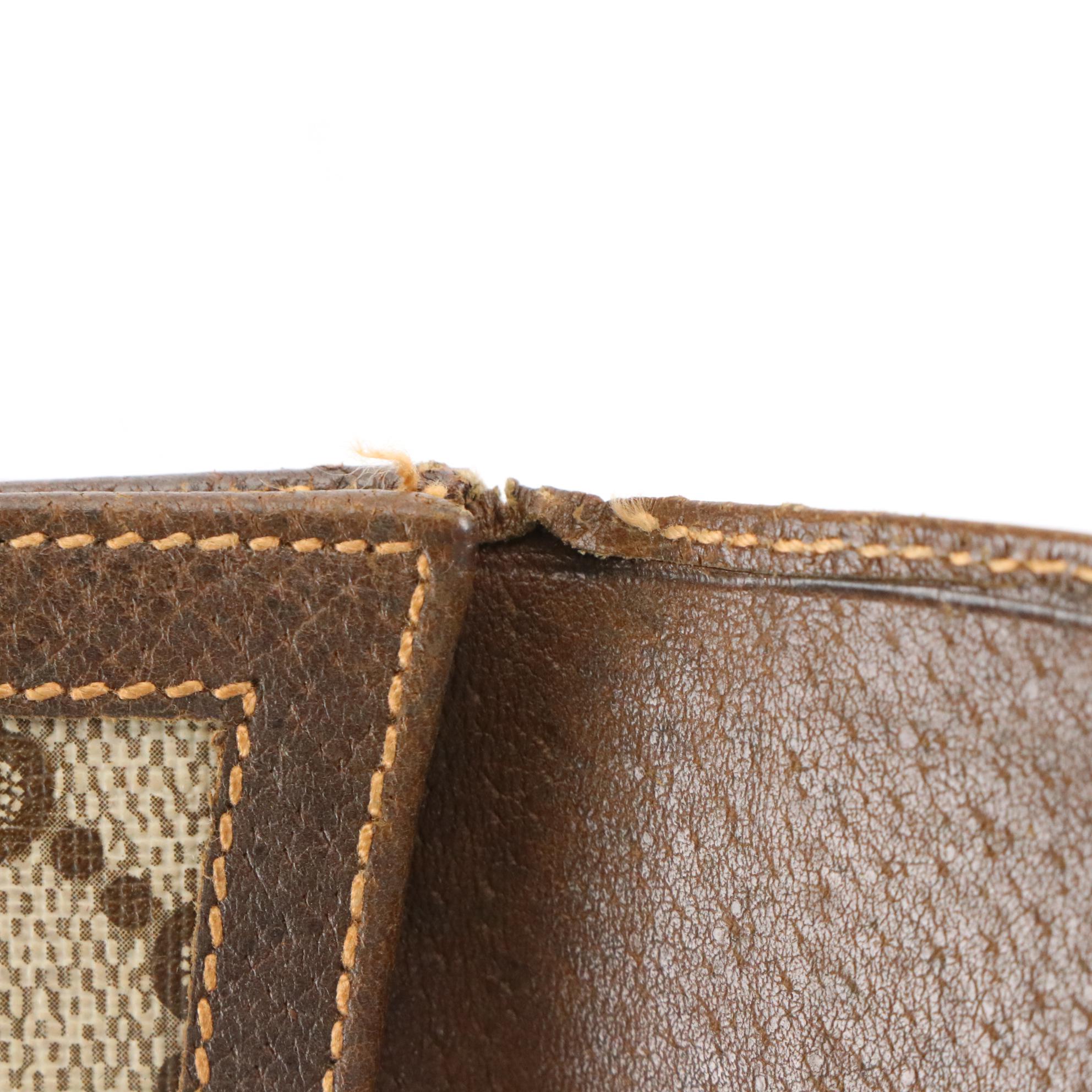 Gucci Accessory Collection Bifold Wallet in GG Supreme Canvas and Brown Leather