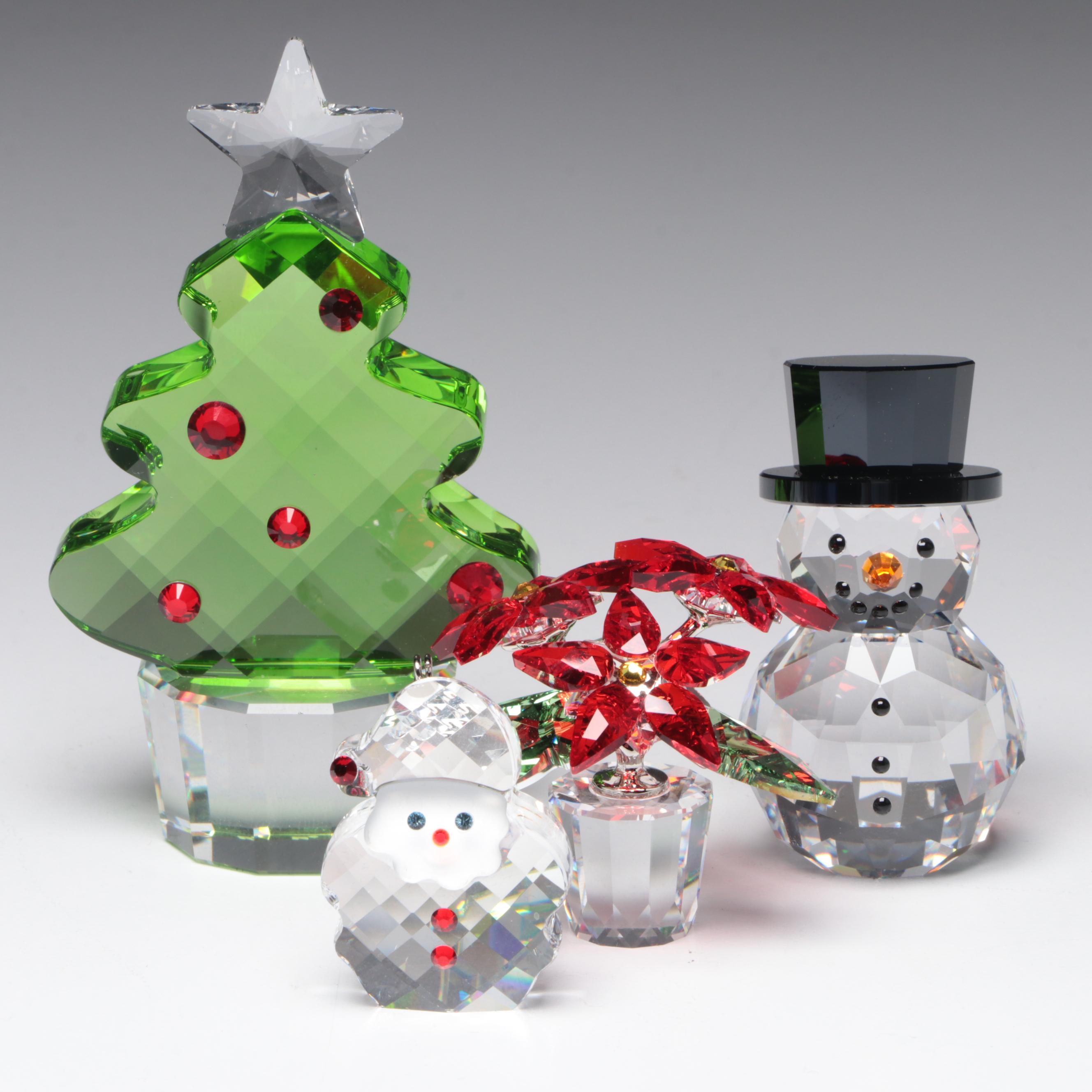 Swarovski Crystal Ornaments Featuring a Poinsettia and Christmas Tree