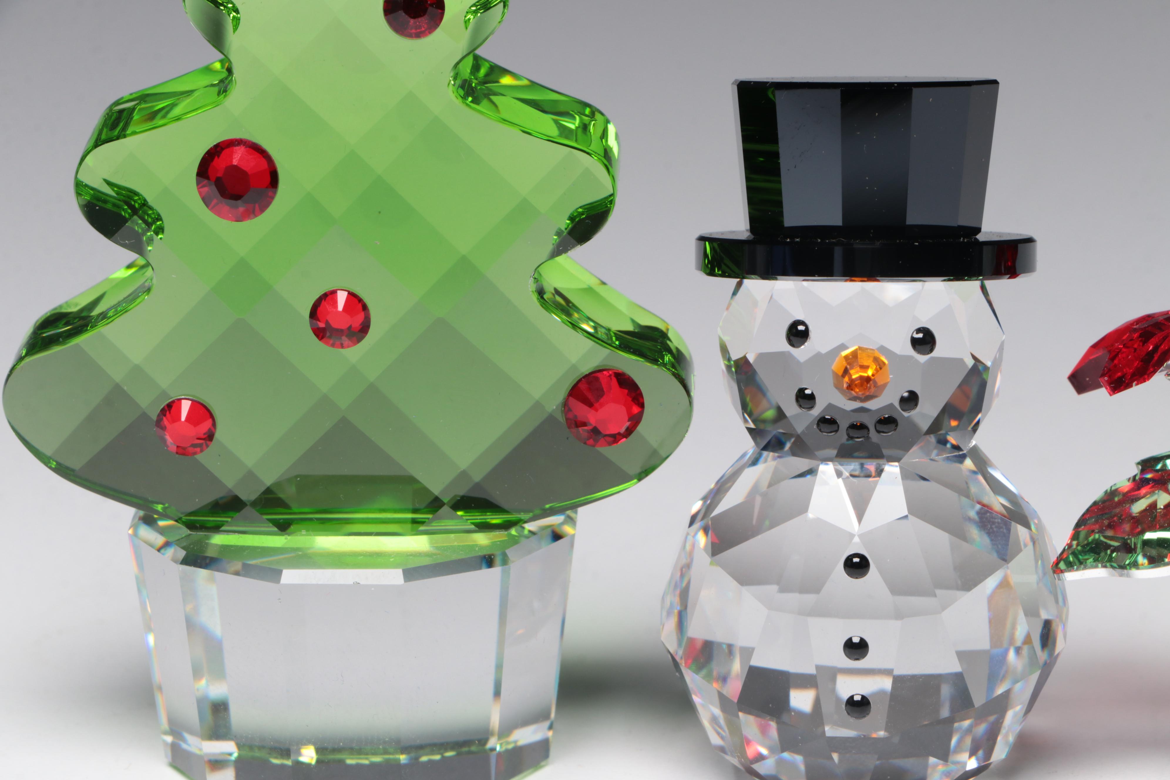 Swarovski Crystal Ornaments Featuring a Poinsettia and Christmas Tree