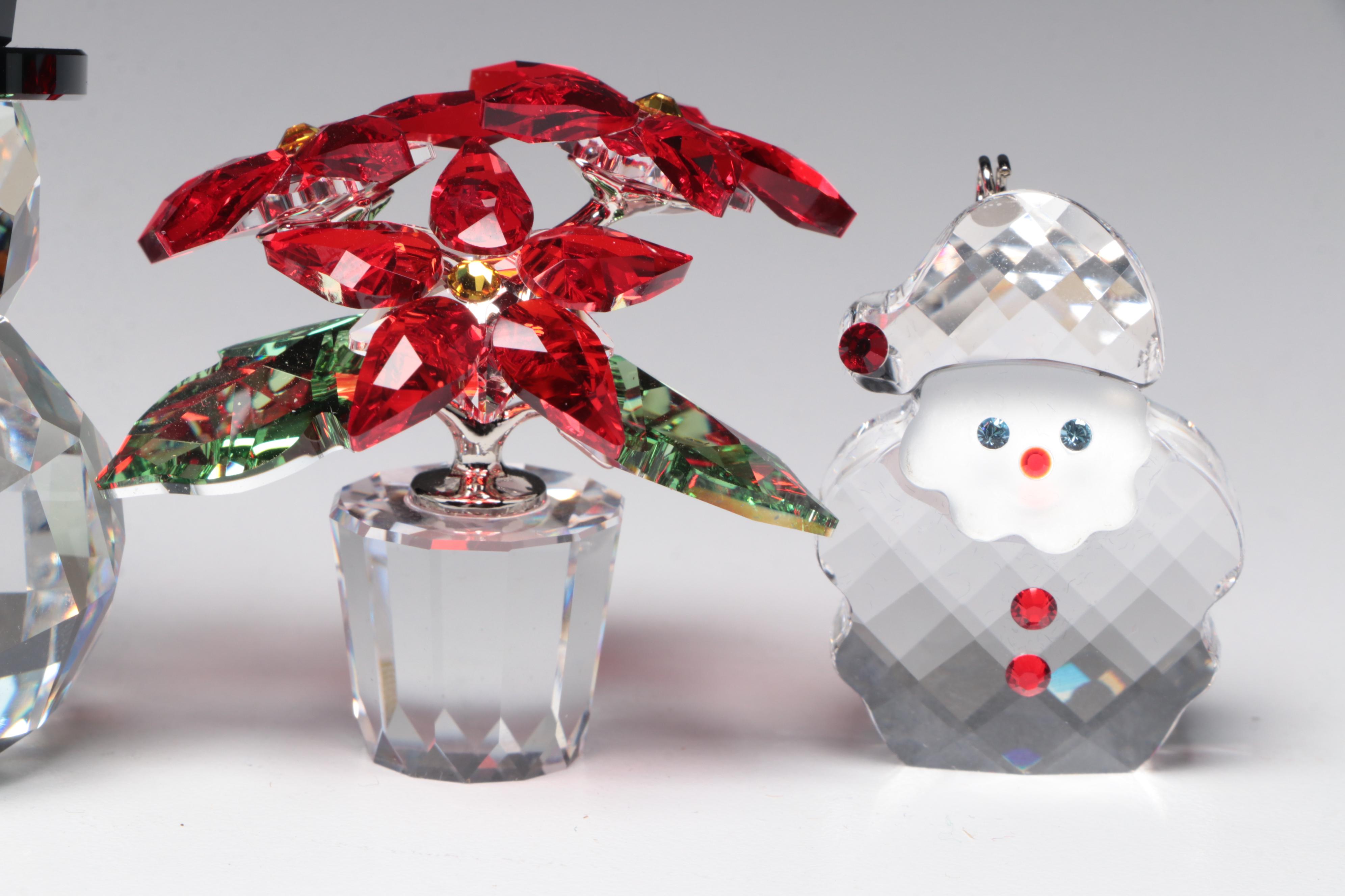 Swarovski Crystal Ornaments Featuring a Poinsettia and Christmas Tree