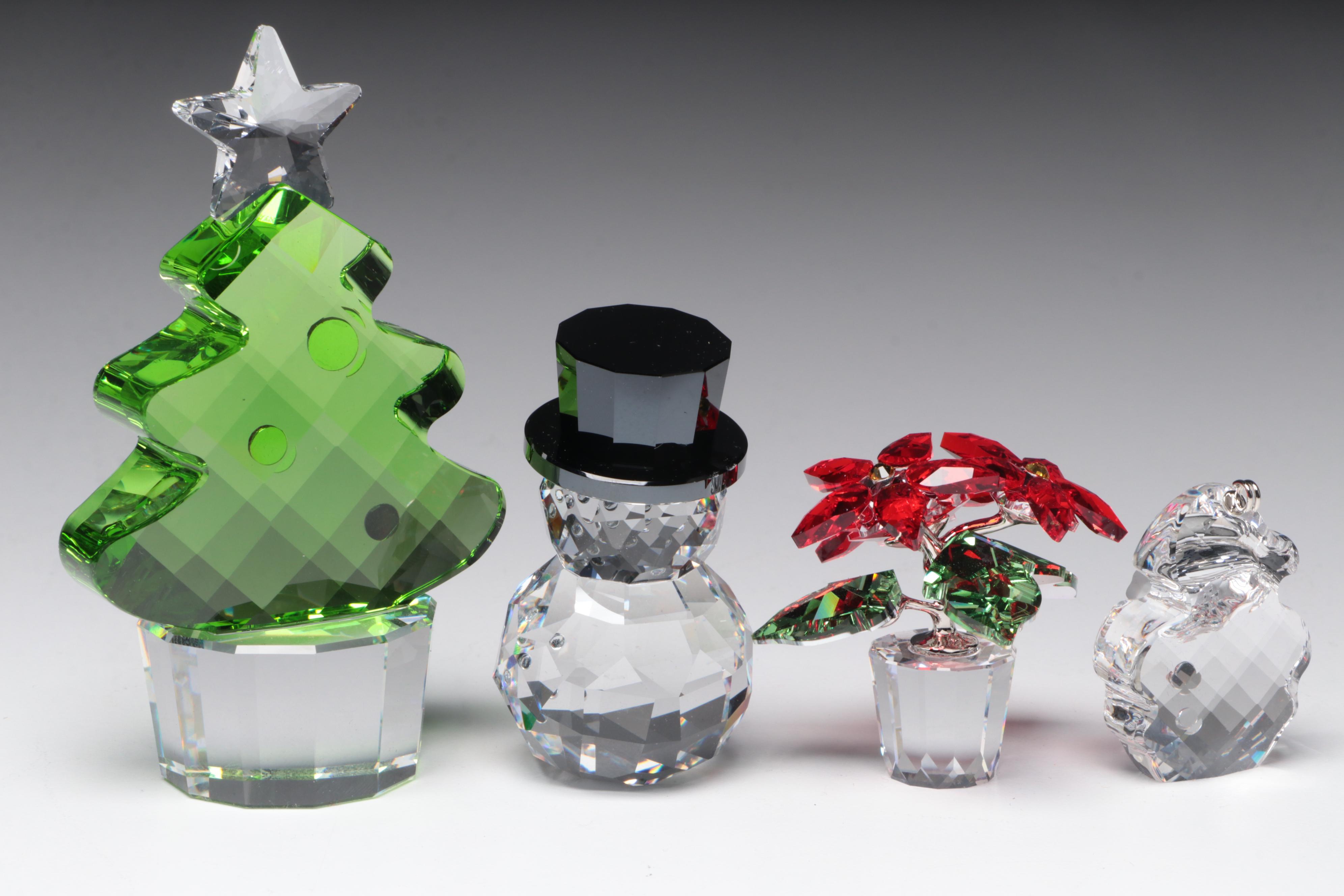 Swarovski Crystal Ornaments Featuring a Poinsettia and Christmas Tree